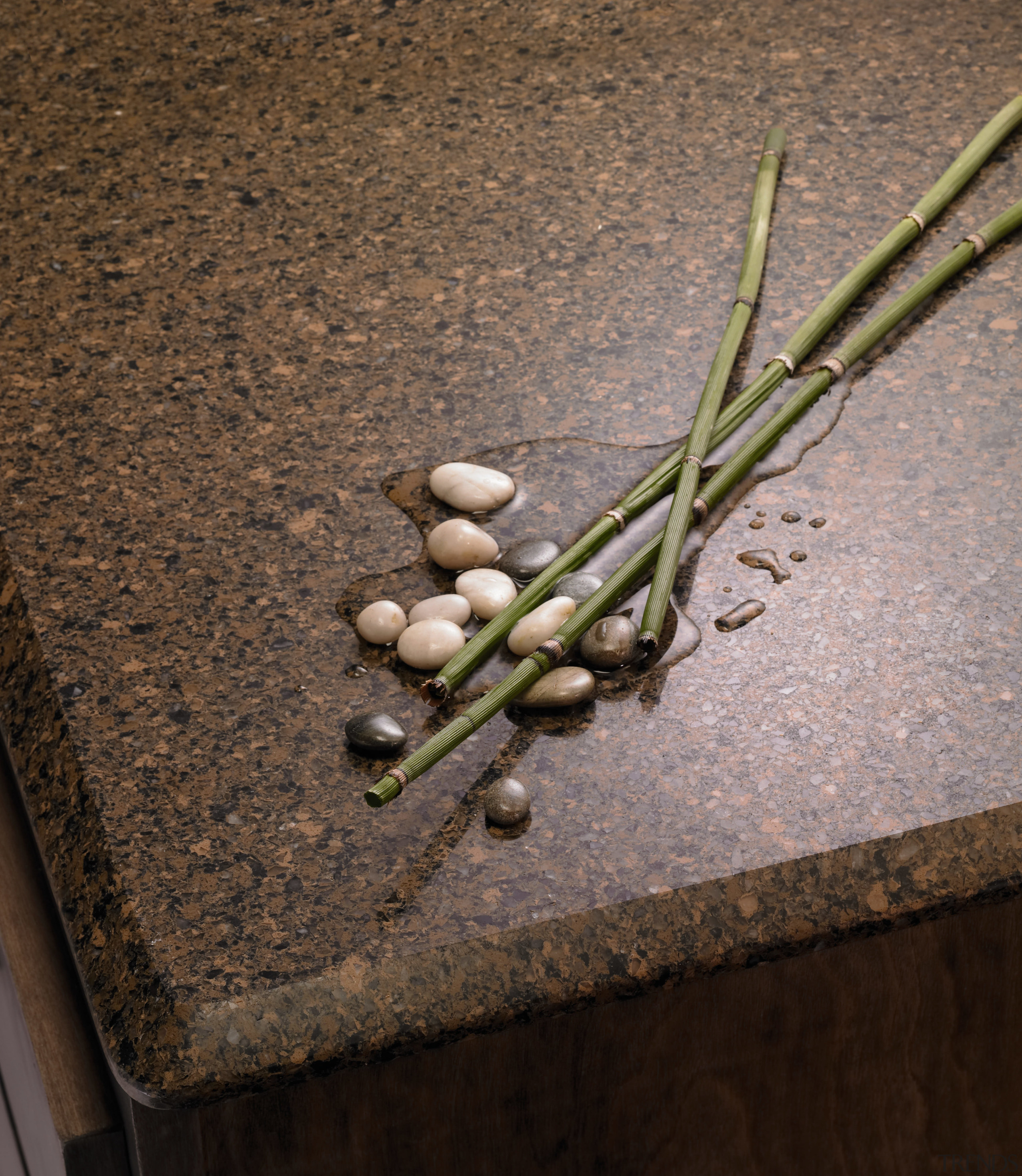 Close view of this countertop from cosentino usa grass, twig, wood, brown, black, gray