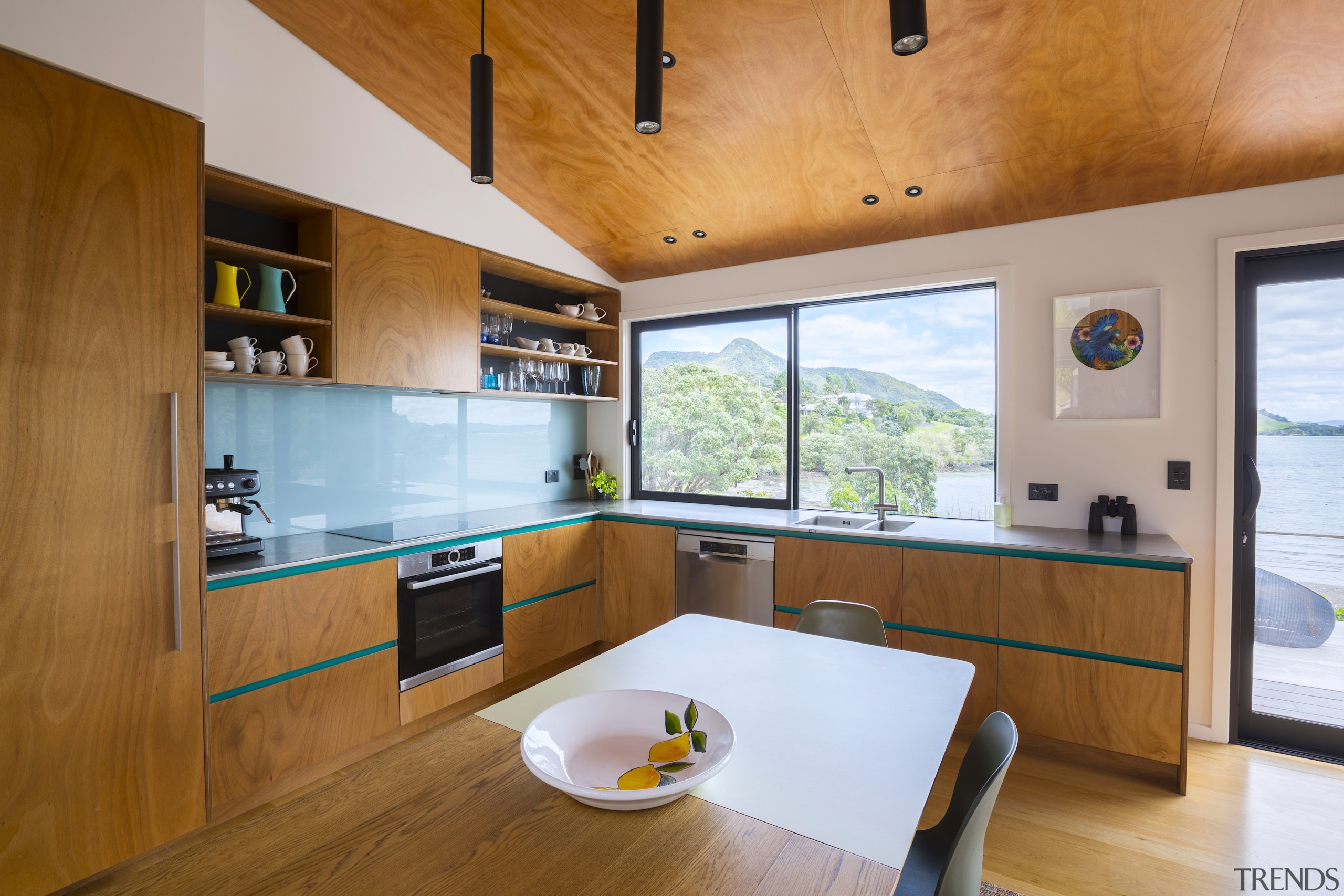 Kitchen with coastal views. - Simple, informal and 