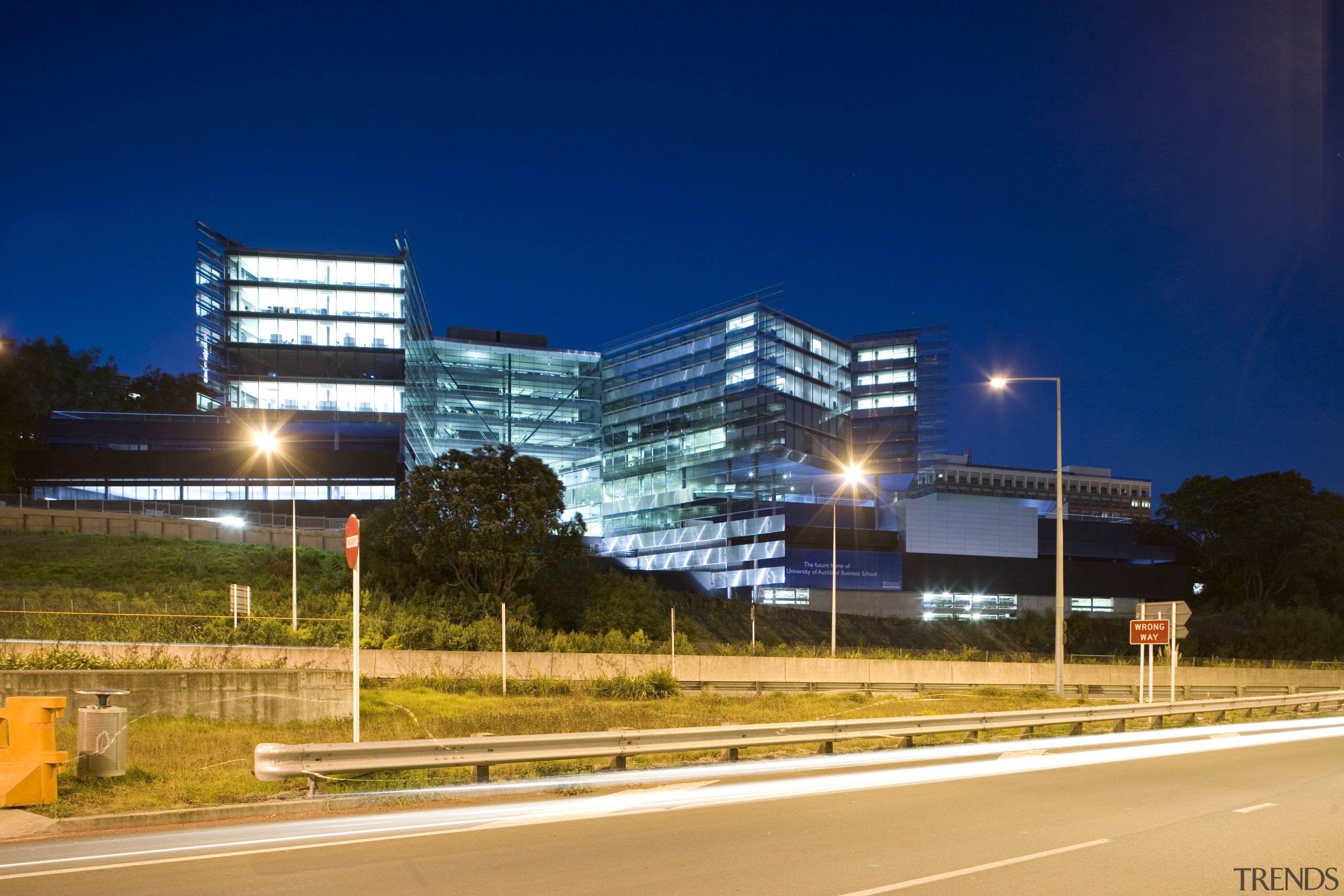 View of the exterior of the Owen G architecture, building, city, commercial building, condominium, corporate headquarters, evening, headquarters, house, infrastructure, lighting, metropolitan area, mixed use, night, real estate, residential area, road, sky, street light, tower block, urban area, blue