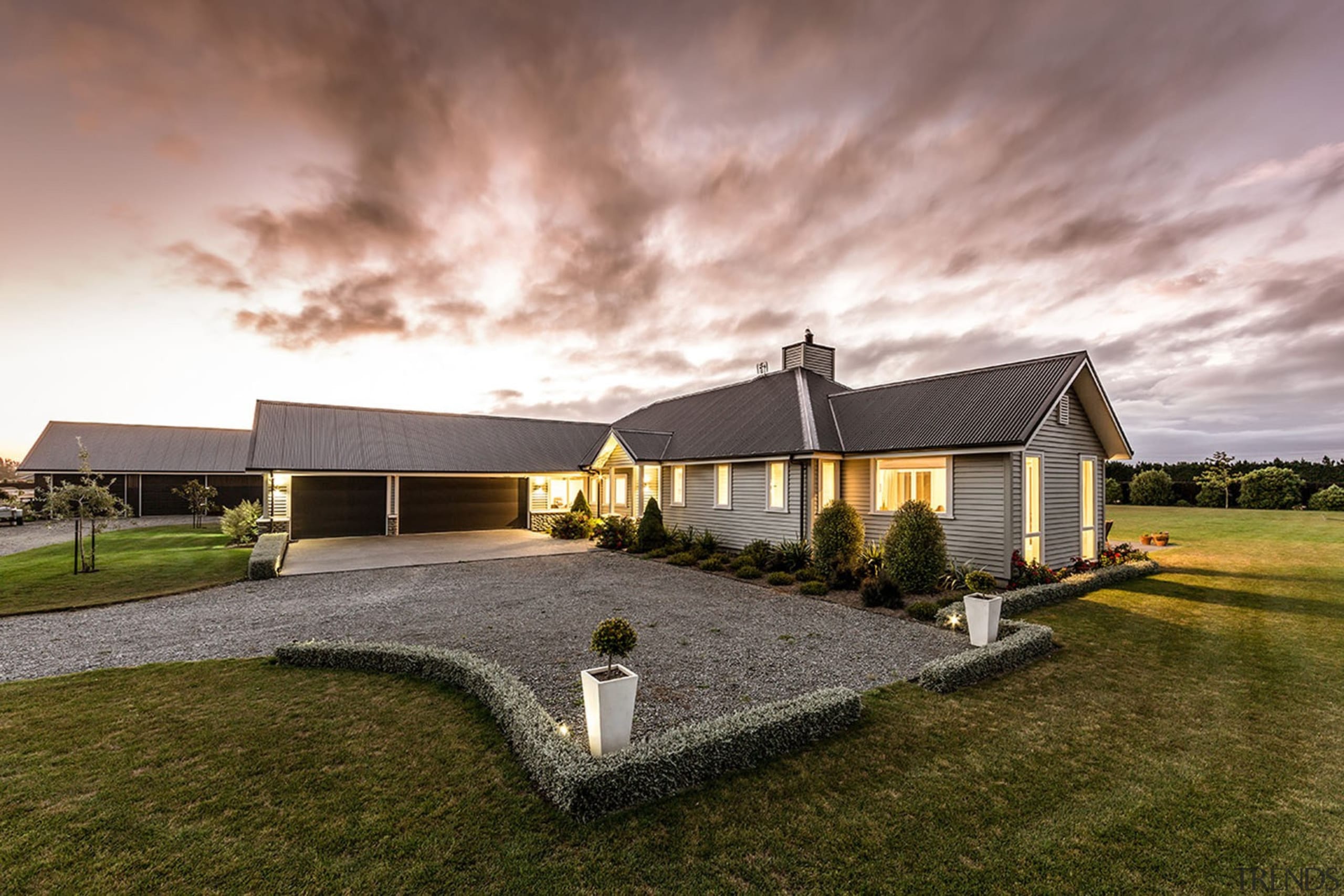 Built to last the test of time, this architecture, cloud, cottage, estate, farmhouse, grass, home, house, landscape, property, real estate, residential area, roof, sky, gray, brown