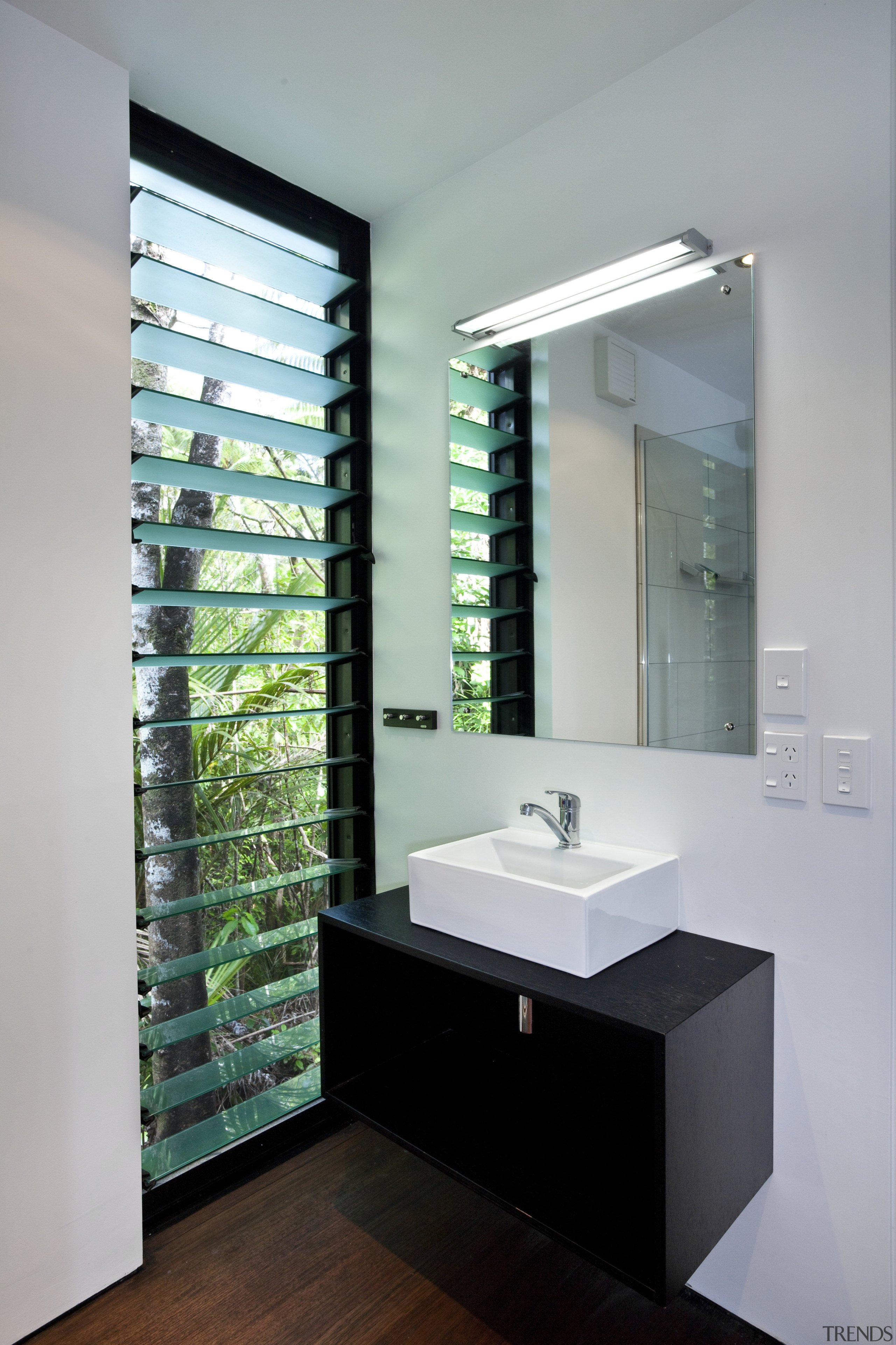 Designed by Chris Tate of Chris Tate Architecture, bathroom, bathroom accessory, bathroom cabinet, glass, interior design, product design, room, gray