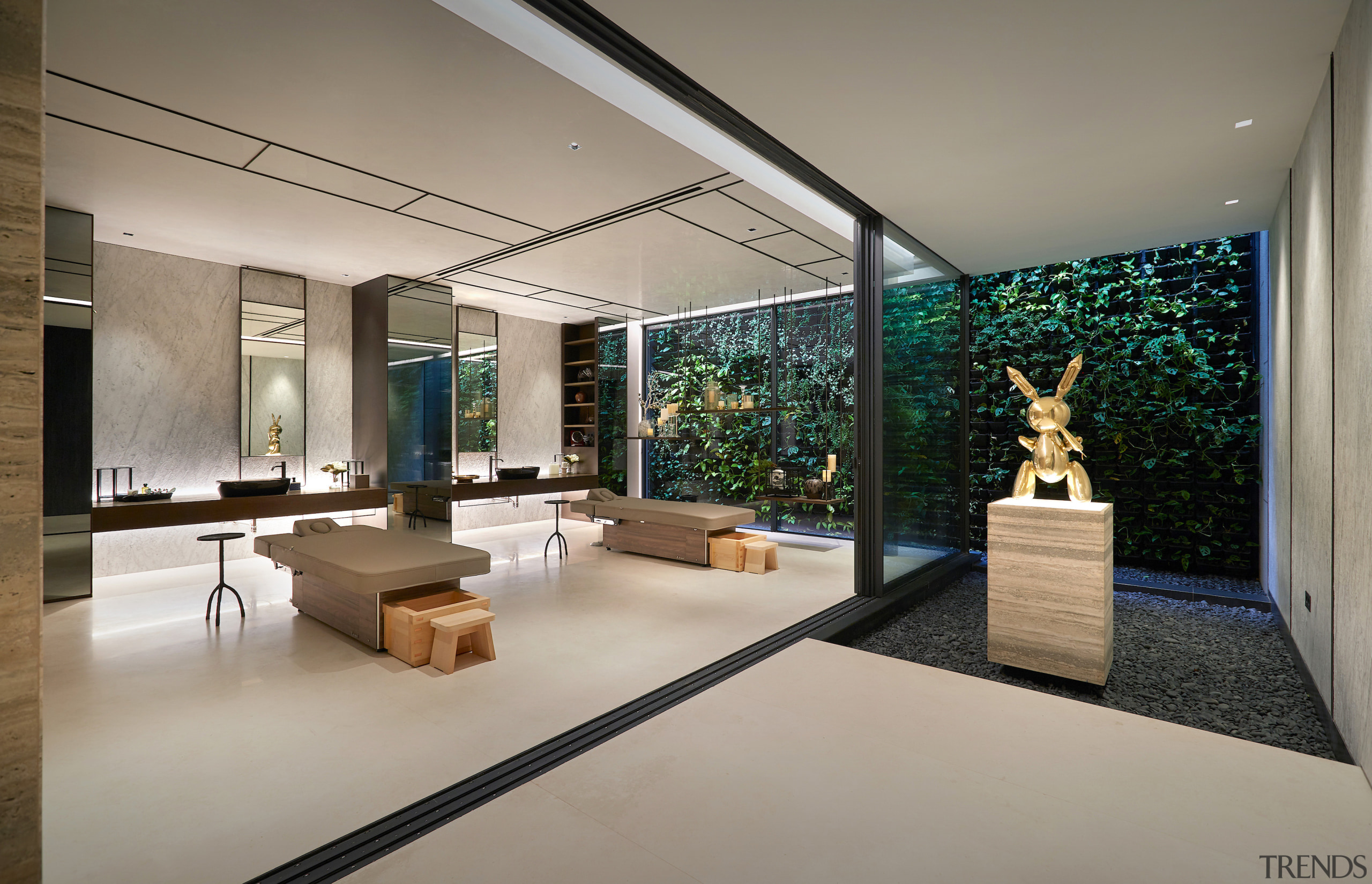 Massage room, sculpture garden and living wall behind. 