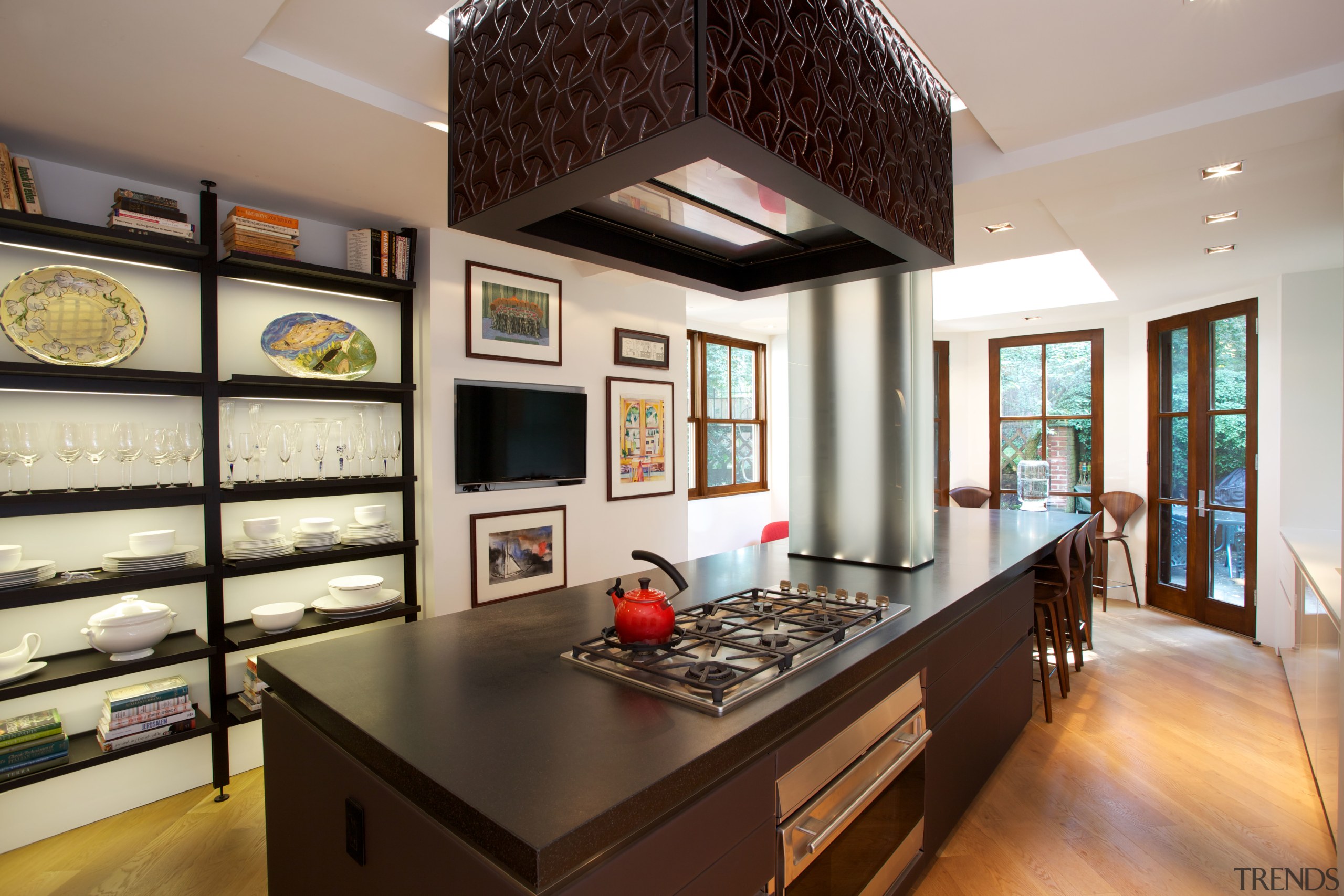 A major remodel has transformed this kitchen, unifying countertop, interior design, kitchen, room, gray