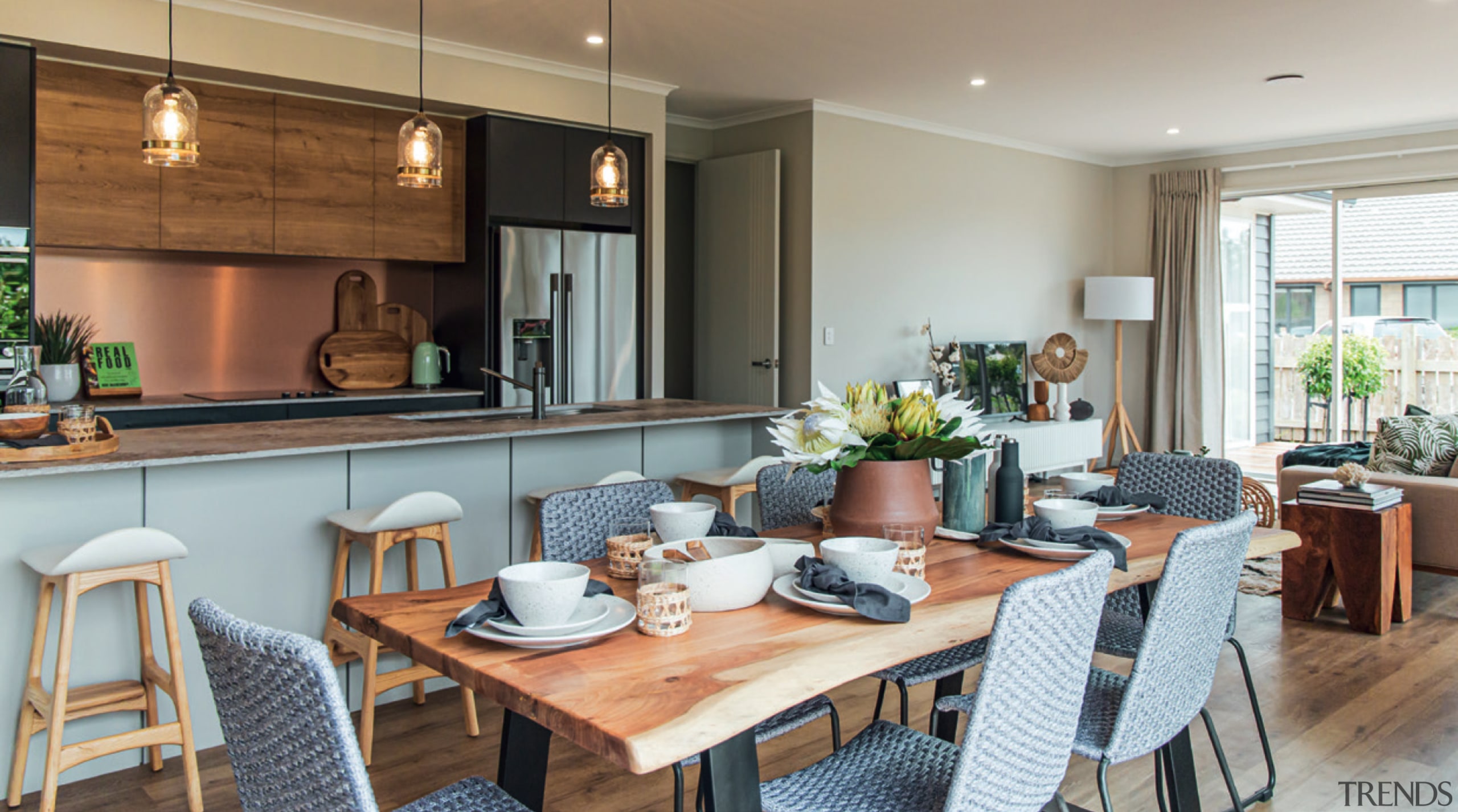 The generous central entertaining space incorporating family, dining 