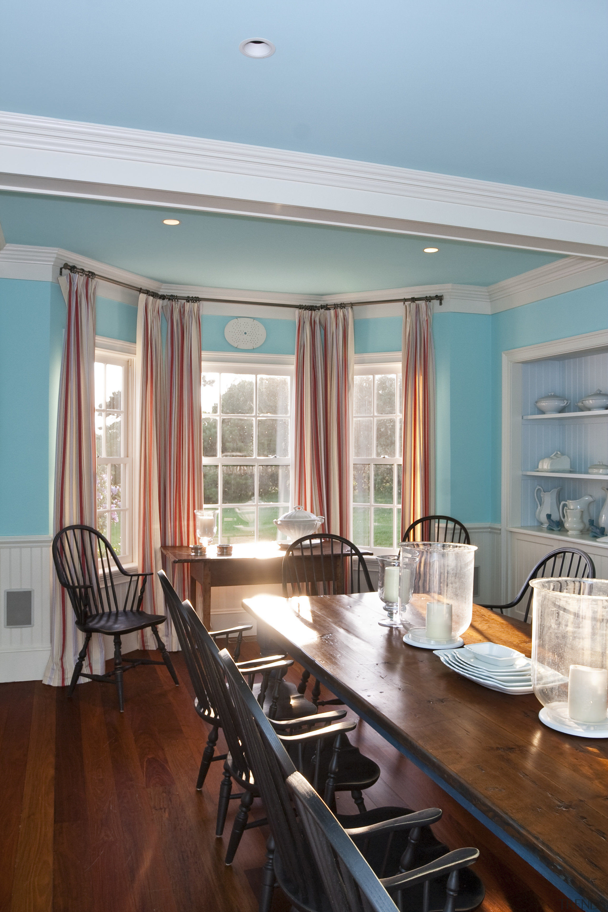 View of dining area featuring wooden floors and ceiling, dining room, home, interior design, living room, real estate, room, table, window, gray, teal