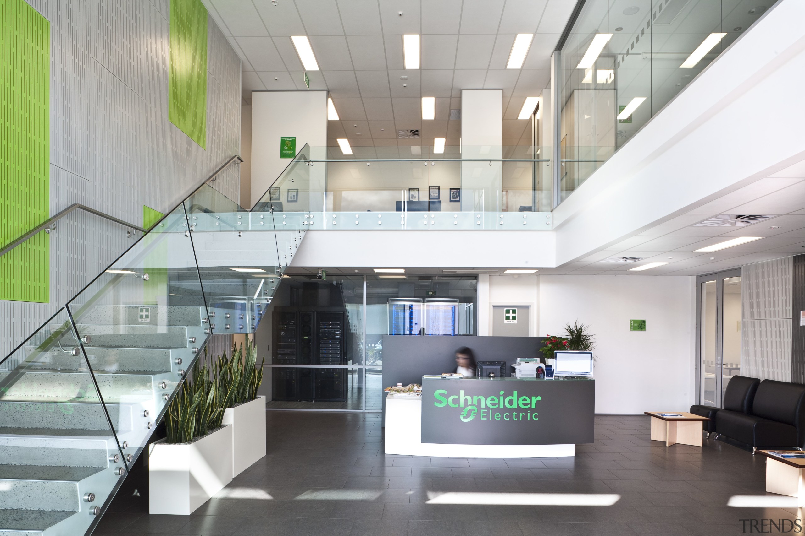 Schneider Electric reflects the latest energy options in architecture, daylighting, interior design, lobby, office, gray