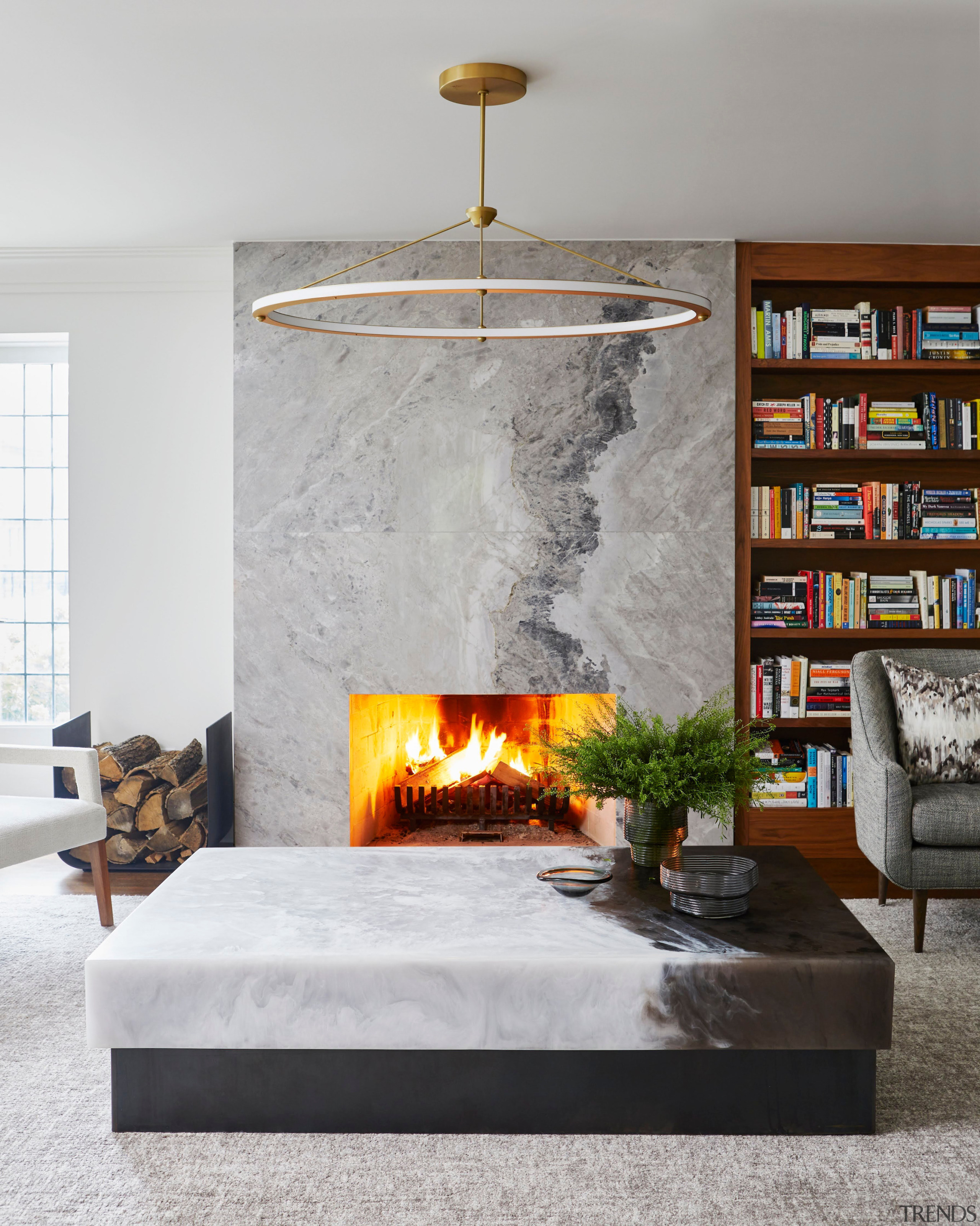Fireplace encased in a natural stone. - Enduring 