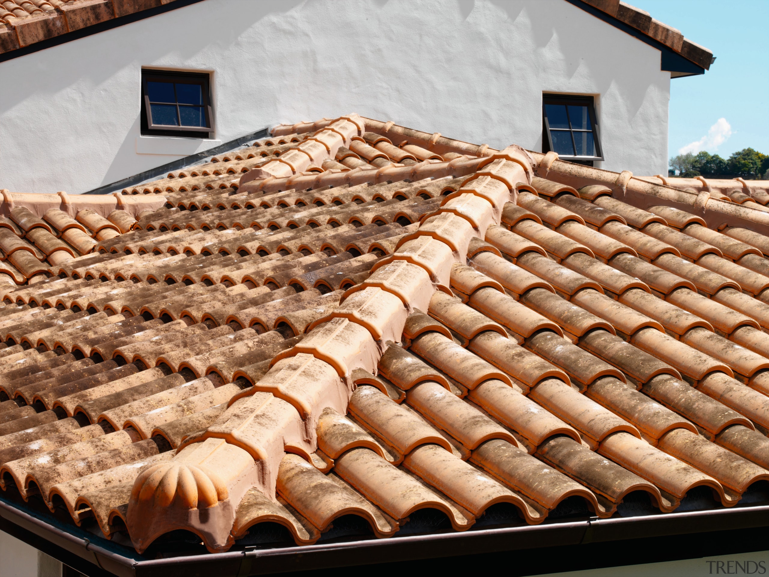 A view of a home using Espana Ceramics. roof, wood, brown, orange