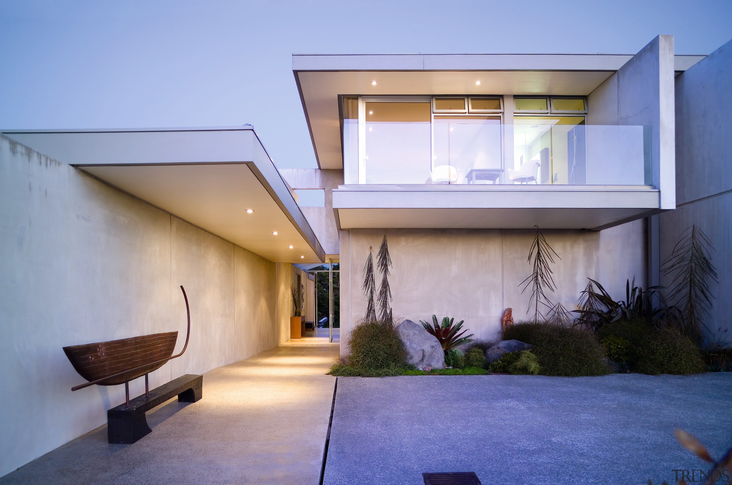 An exterior view of the entrance way to architecture, building, daylighting, estate, facade, home, house, interior design, property, real estate, residential area, roof, window, blue