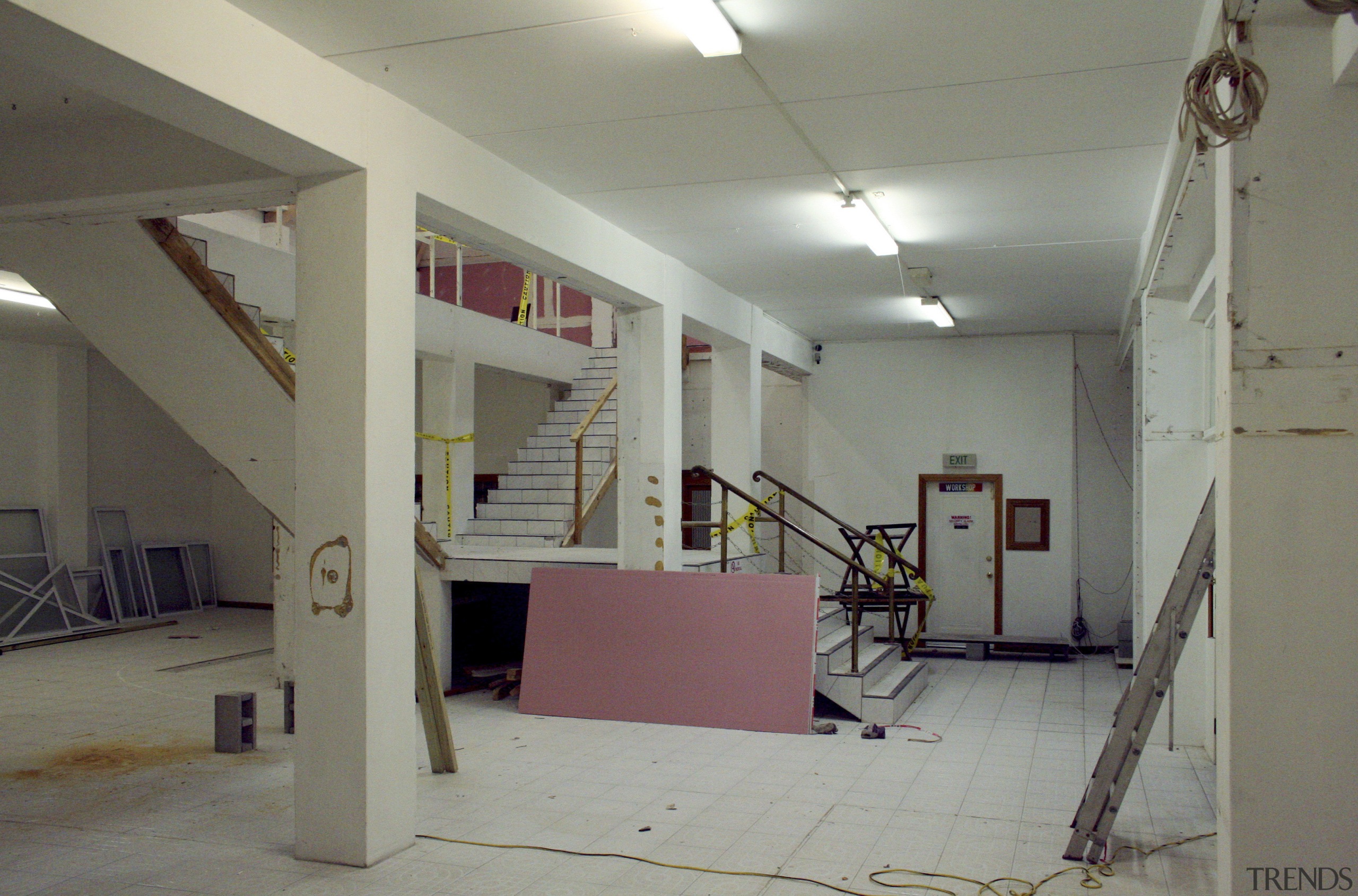 Interior view of post office prior to restoration. ceiling, floor, interior design, room, wall, gray