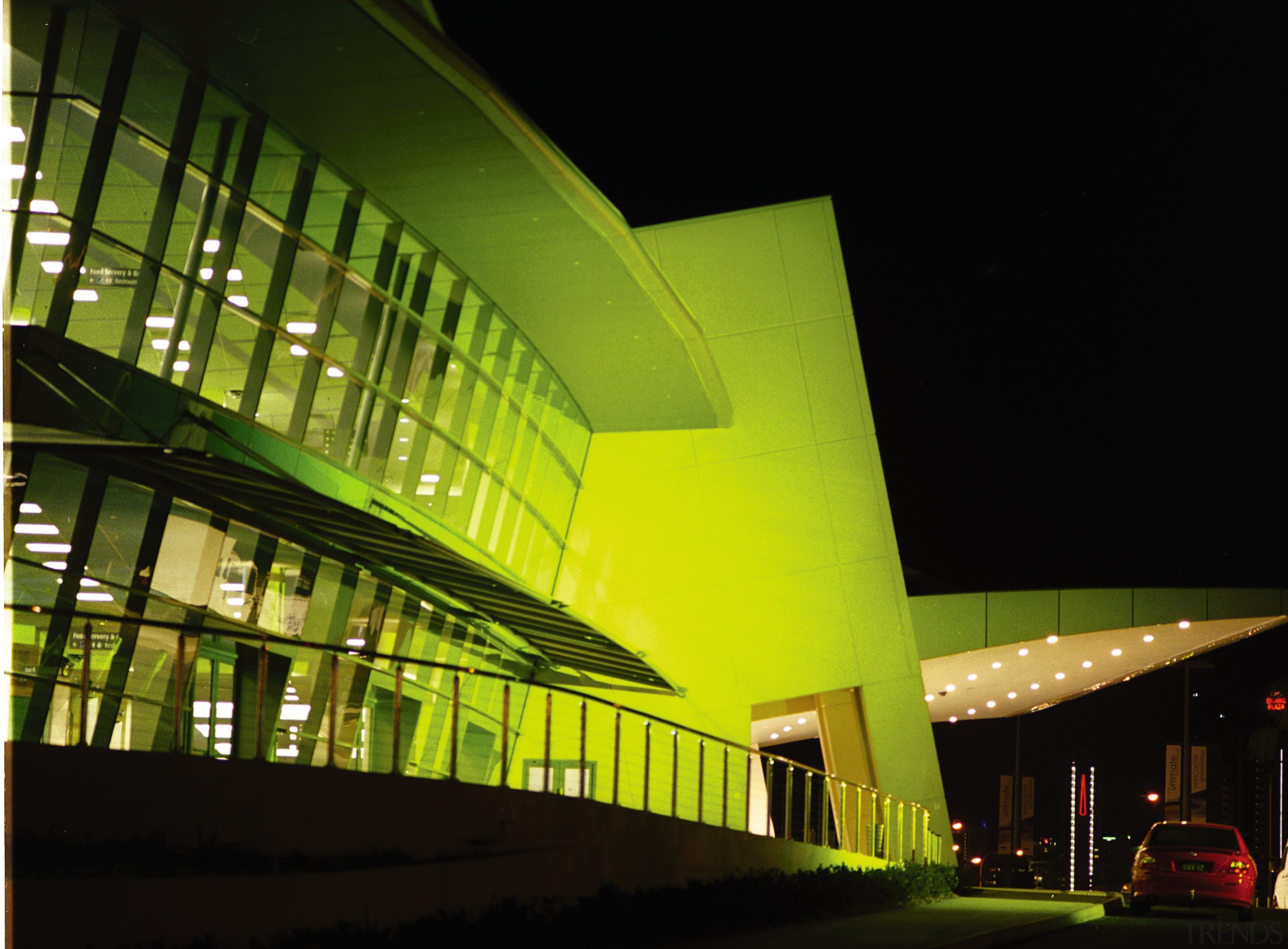 Night view of exterior of convention centre with architecture, building, convention center, corporate headquarters, daylighting, headquarters, metropolitan area, mixed use, night, performing arts center, structure, black