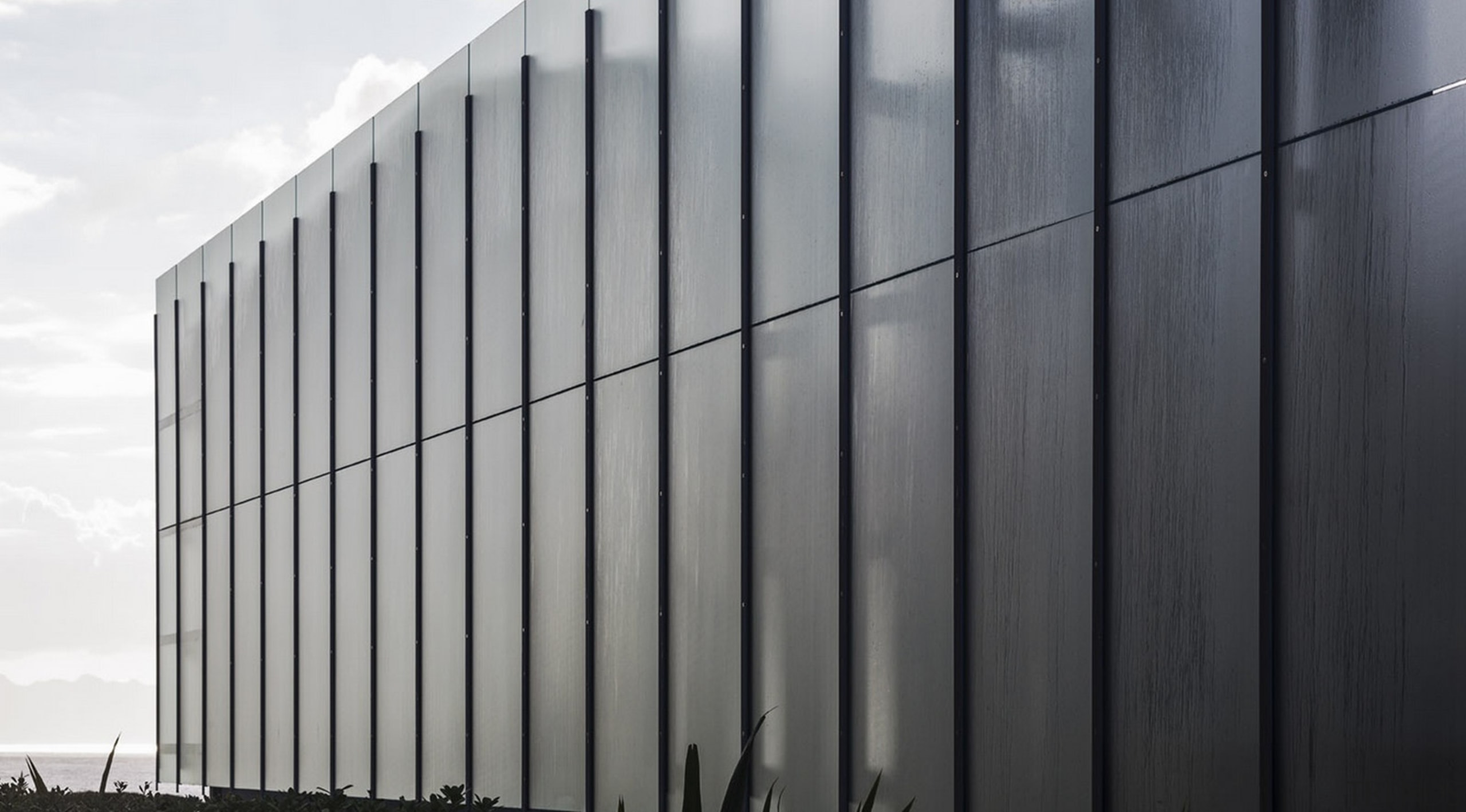 Winner of the Villa Category at the World architecture, black and white, building, corporate headquarters, daylighting, facade, headquarters, line, sky, structure, wall, gray, black