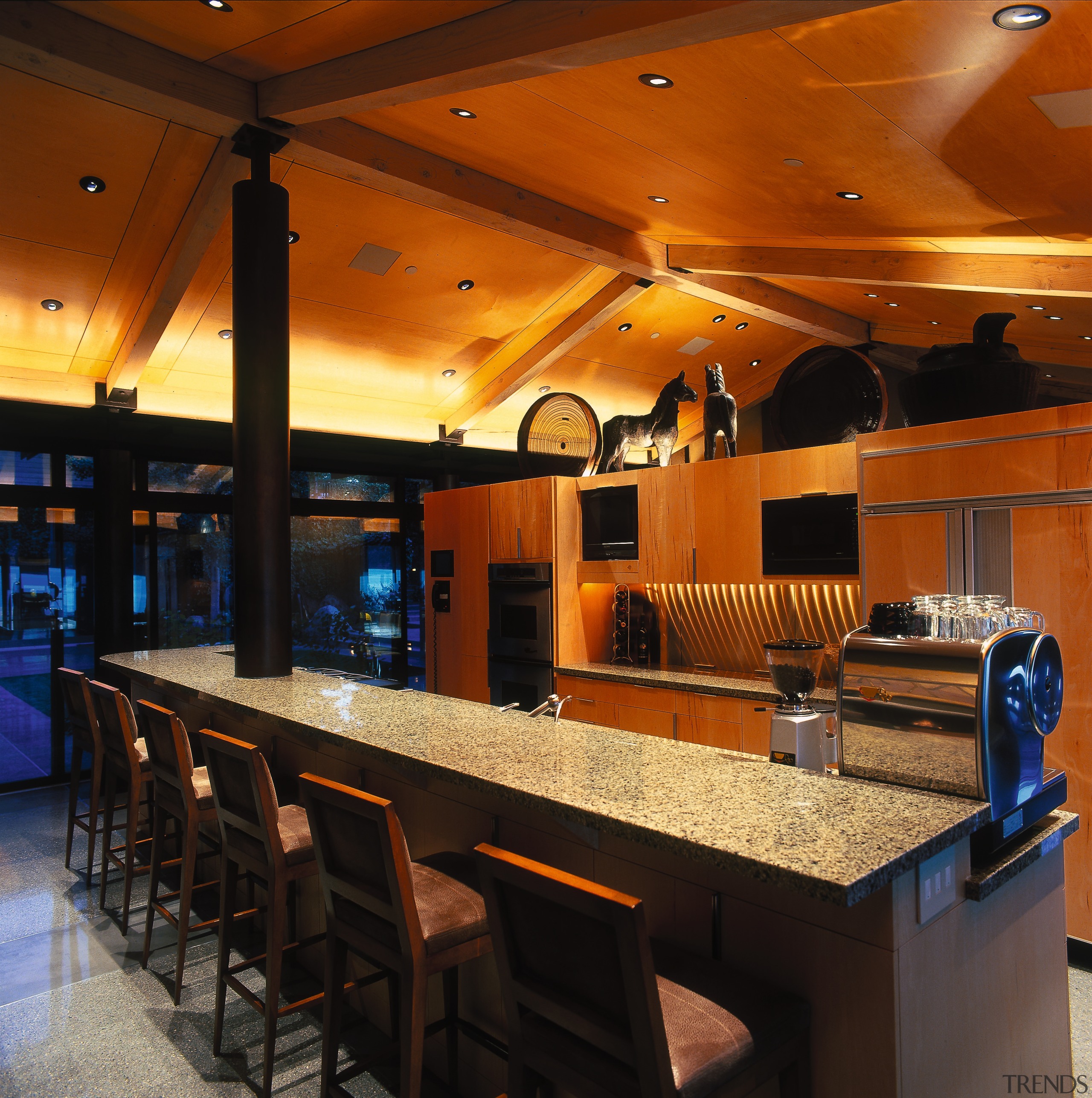 View of this modern kitchen - View of countertop, interior design, lighting, restaurant, table, brown, black