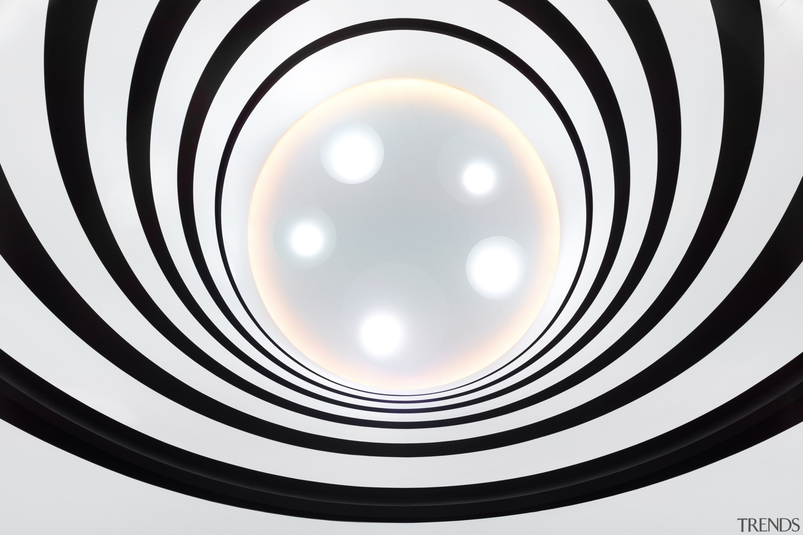 This atrium's alternating ribbons of white balustrades and black and white, circle, line, product design, spiral, white, black