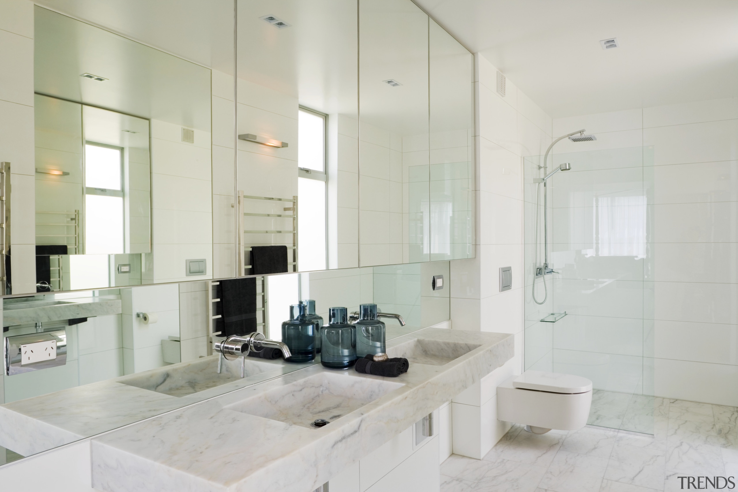 The master bathroom is open to the bedroom, bathroom, floor, interior design, room, sink, tile, gray, white