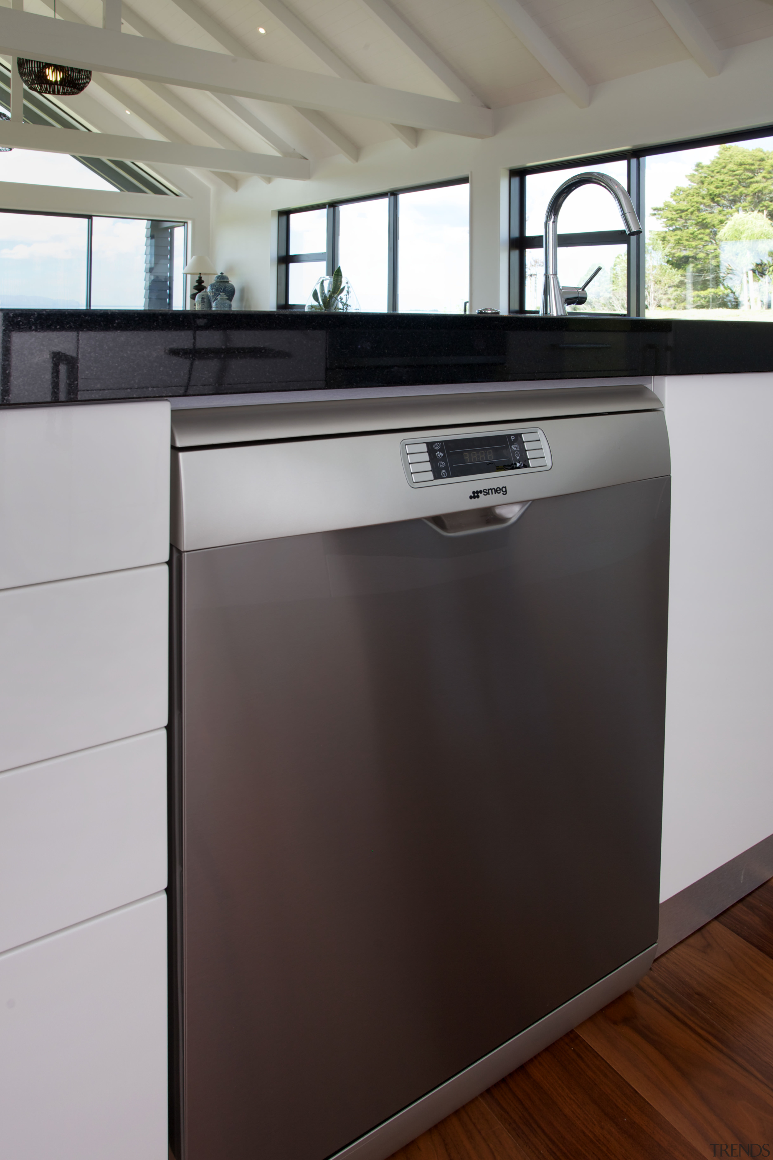 The Te Arai Estate show home is equipped cabinetry, countertop, home appliance, kitchen, kitchen appliance, major appliance, gray, black