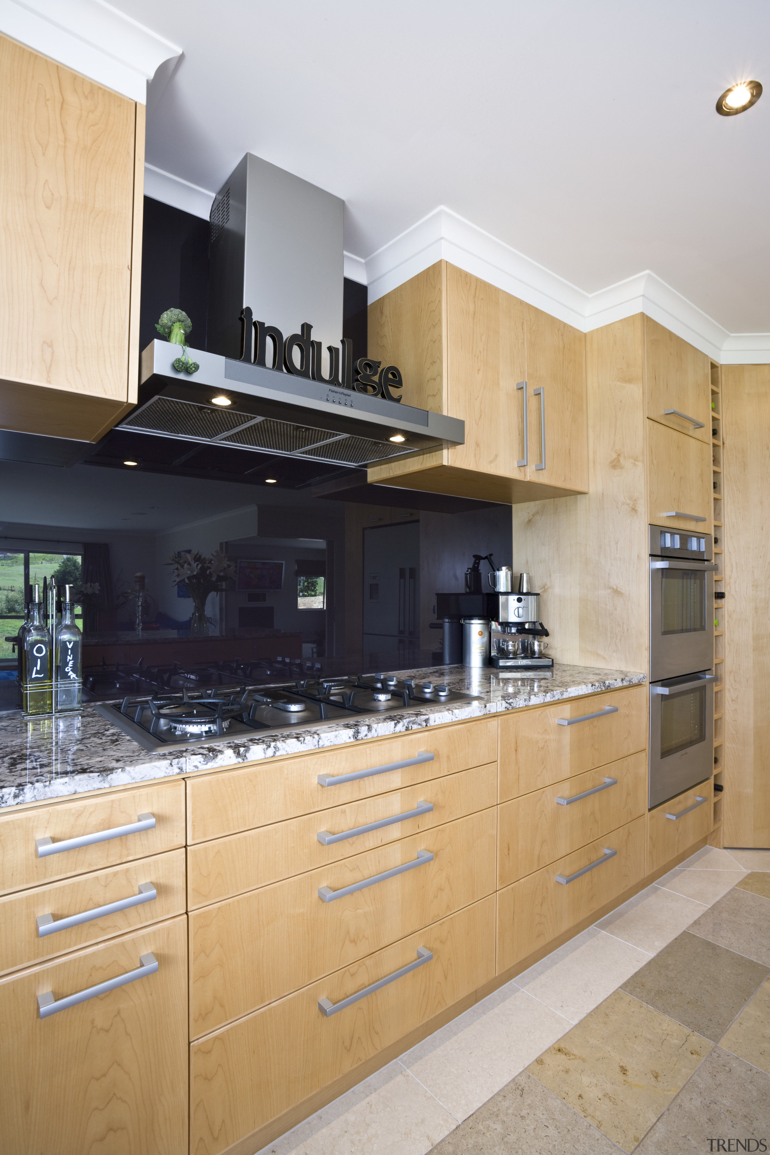 View of a kitchen designed and manufactured by cabinetry, countertop, cuisine classique, interior design, kitchen, room, orange