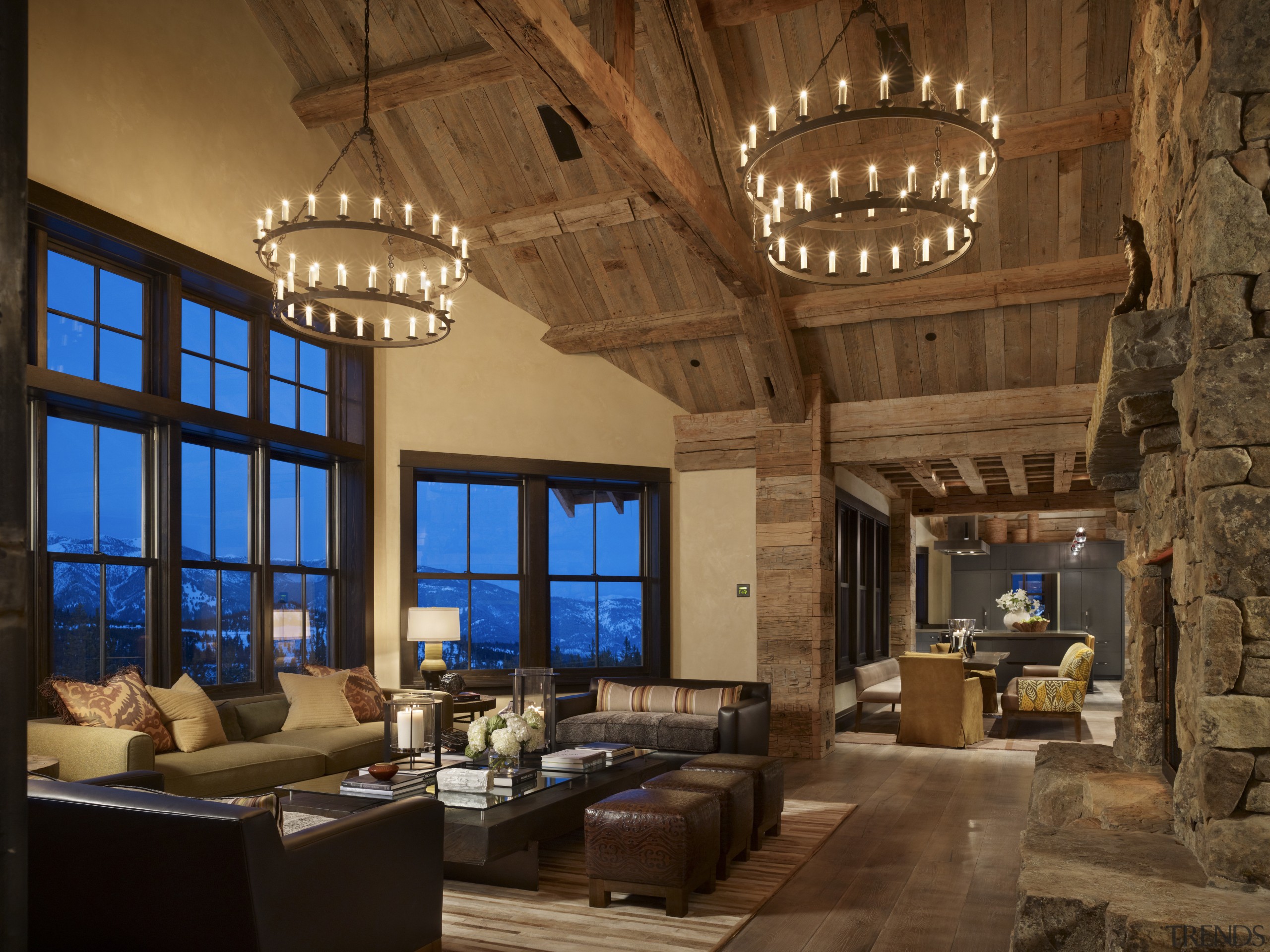 The living spaces in this mountain home feature ceiling, estate, interior design, living room, brown