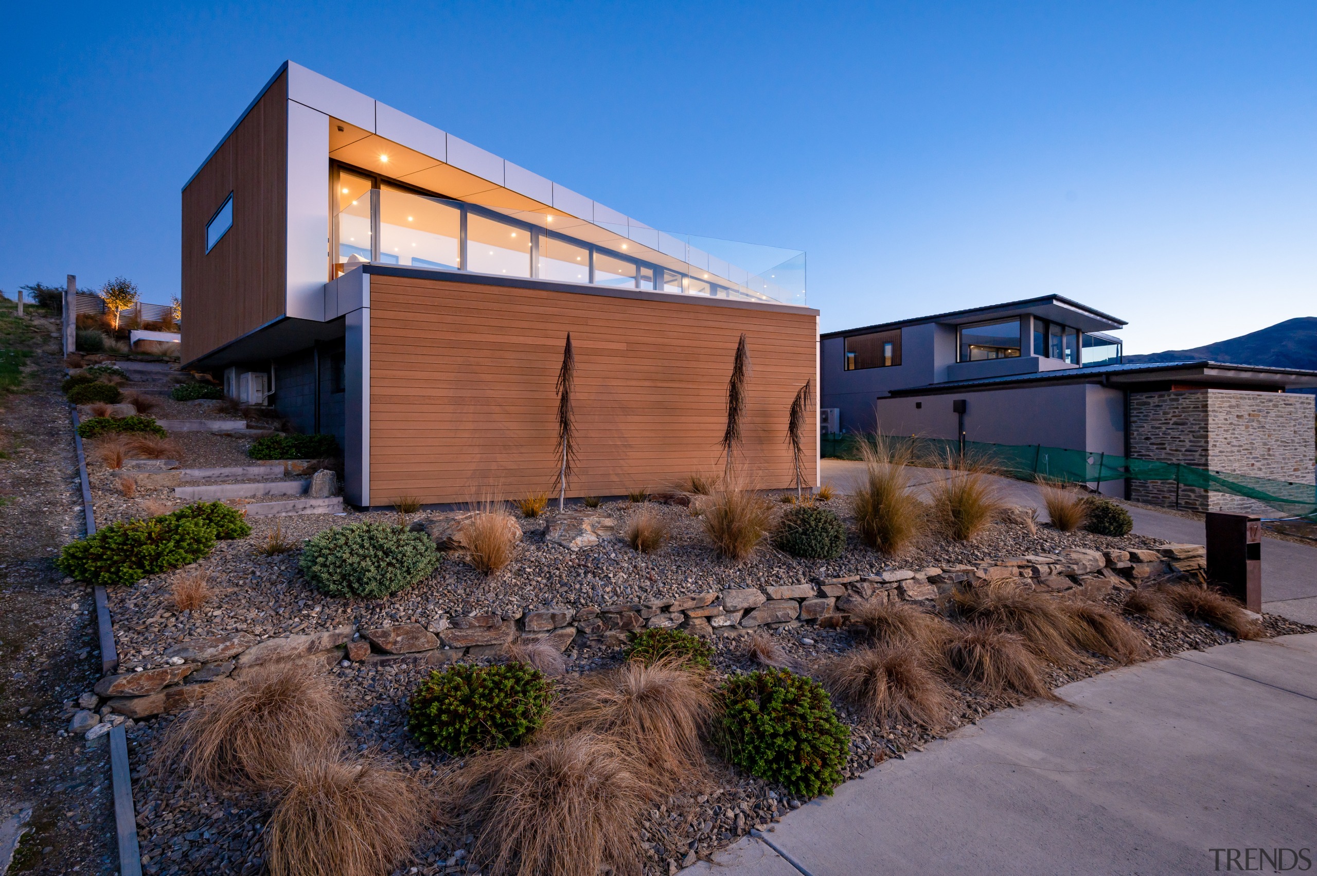 The landscaping at the front of the home. 