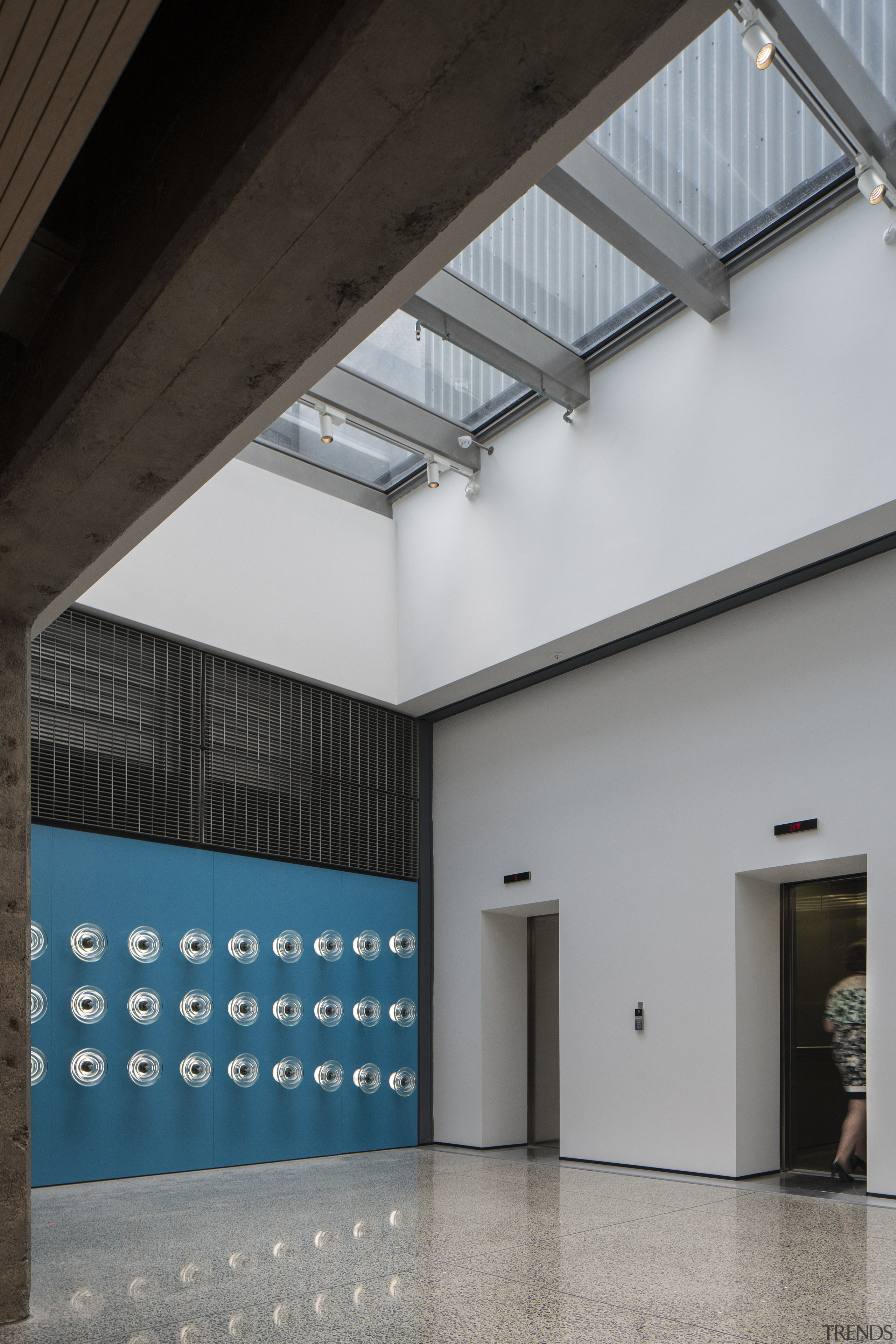 The glass-roofed lift lobby at Waikoukou, the reinvented, architecture, building, ceiling, daylighting, gray, black