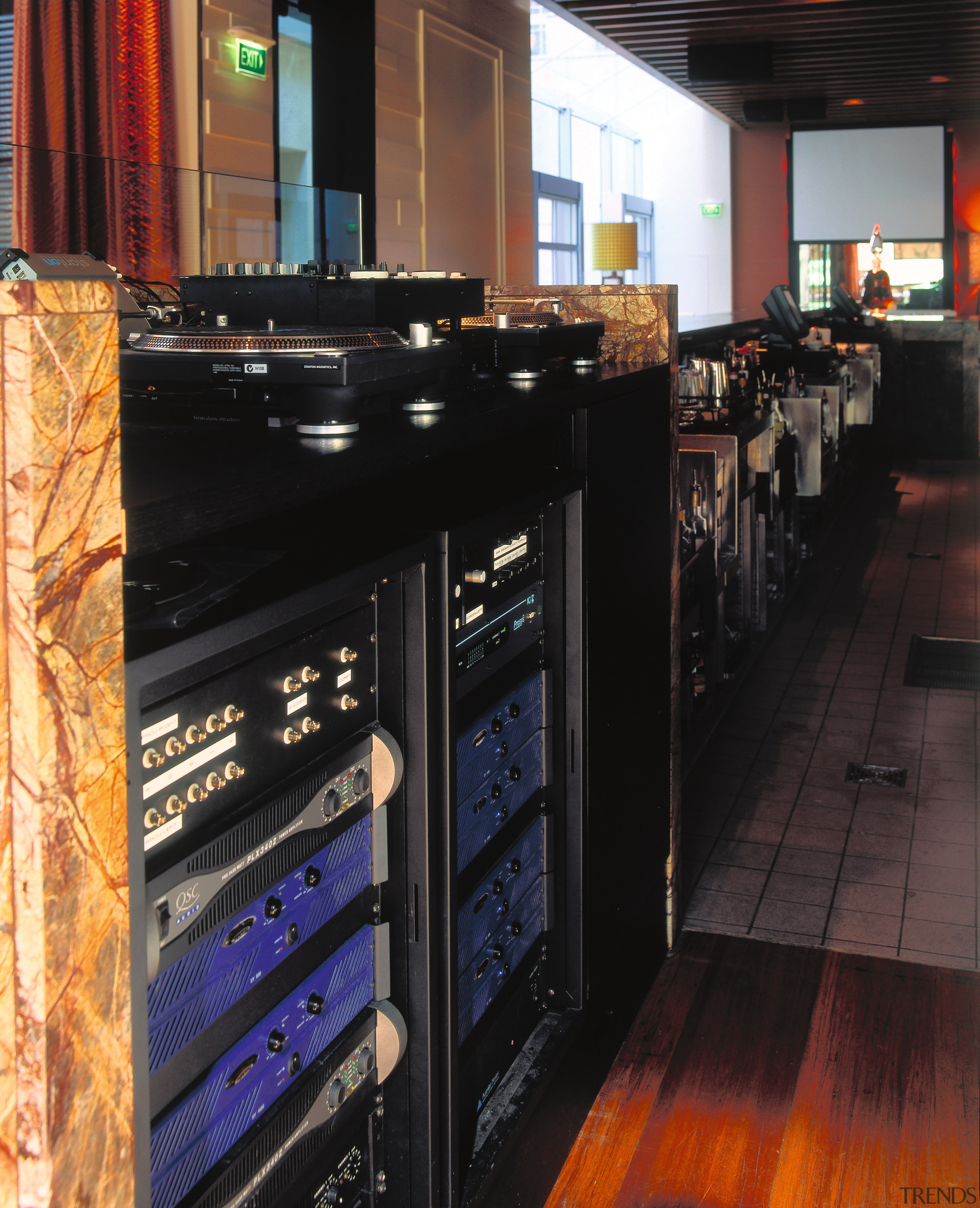 Integrated sound system in bar area. - Integrated electronics, flooring, black