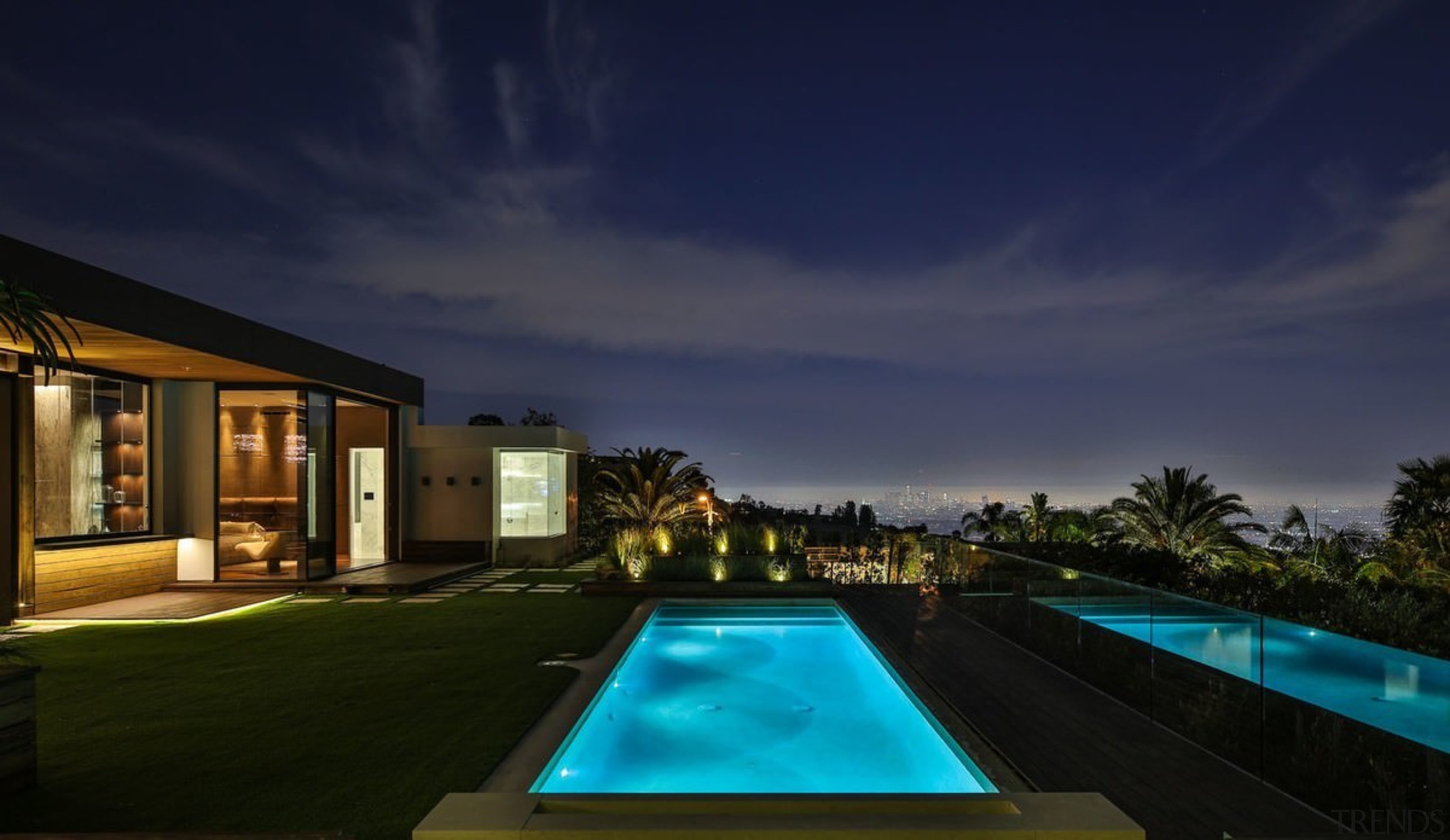 The indoor/outdoor living – and the panoramic views architecture, estate, evening, home, house, landscape lighting, leisure, lighting, night, property, real estate, reflection, residential area, resort, sky, swimming pool, villa, blue, black