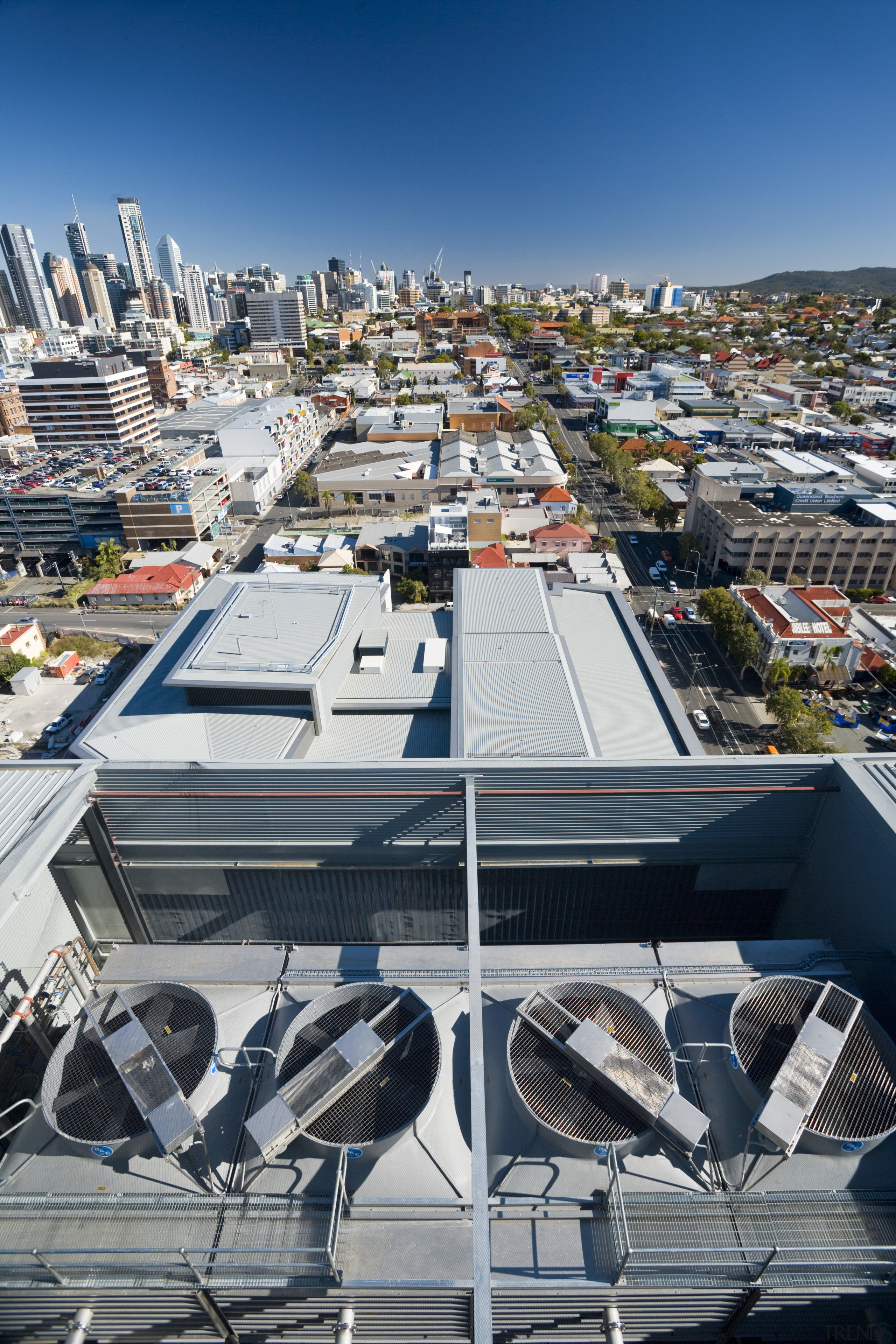 Cooling towers on the building roof are one architecture, building, city, cityscape, condominium, daytime, marina, metropolis, metropolitan area, real estate, residential area, roof, sky, urban area, urban design, gray