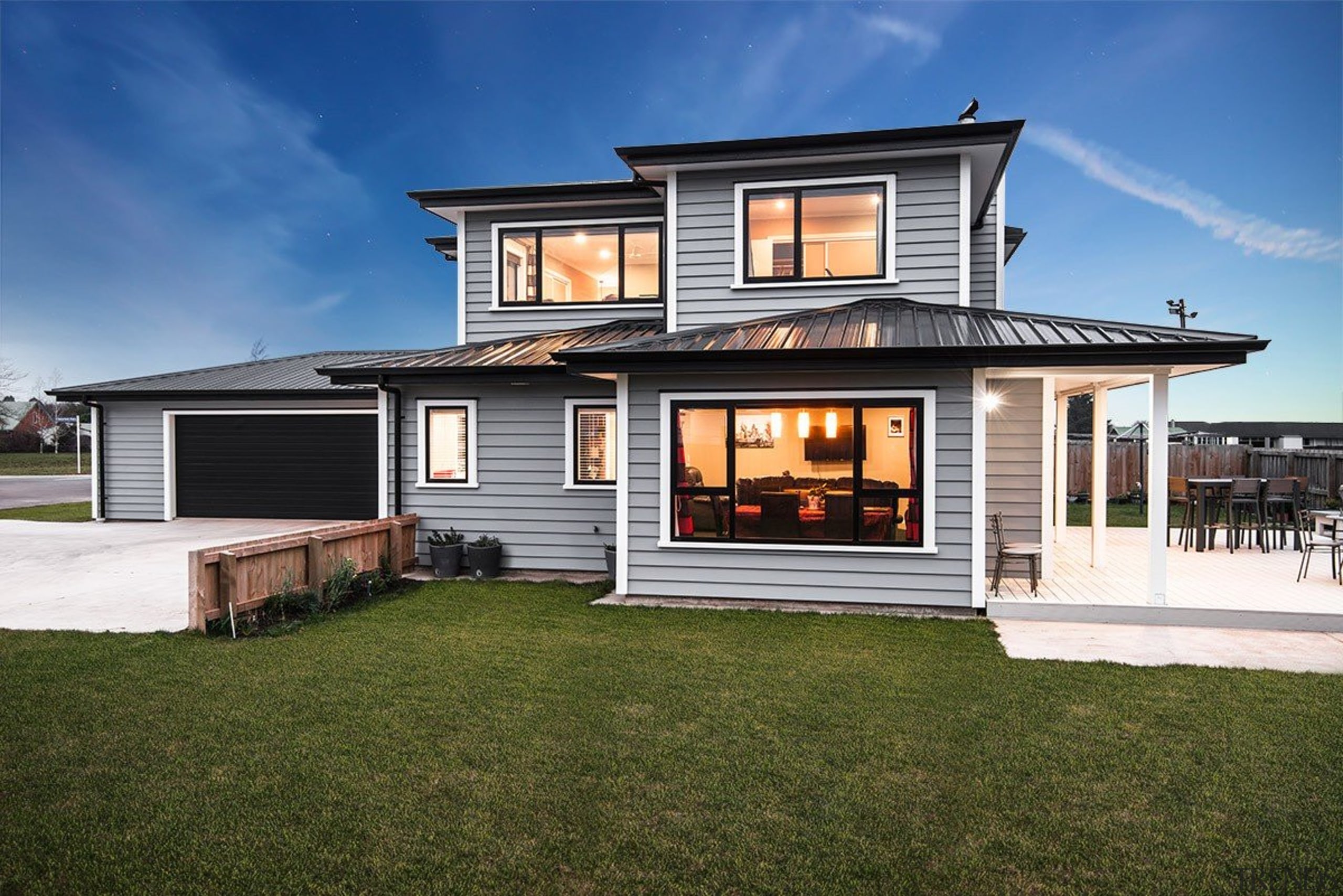 A new home clad with Envira Weatherboard System cottage, elevation, estate, facade, home, house, luxury vehicle, property, real estate, residential area, siding, window, brown, blue