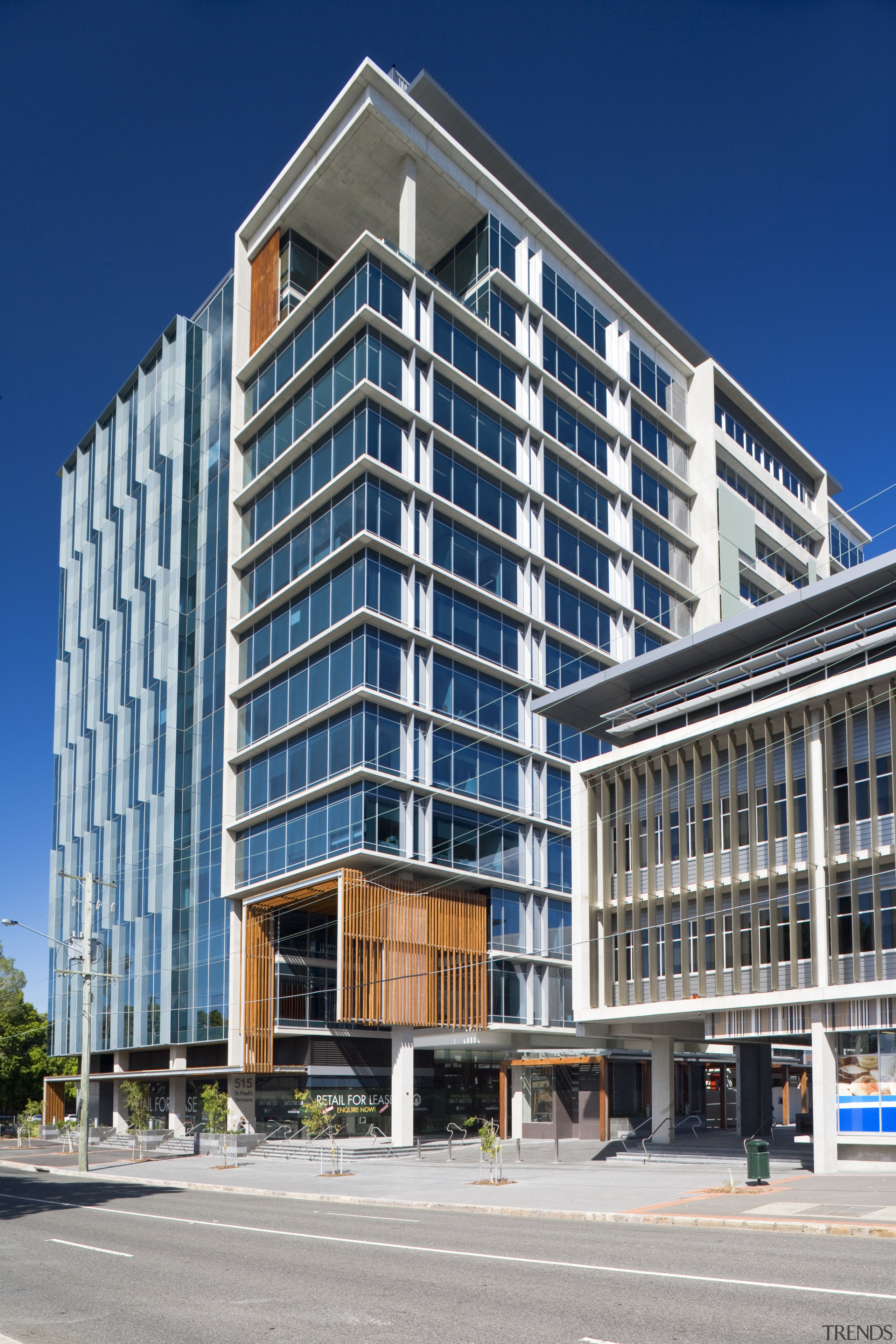 Image of a development which is part of apartment, architecture, building, city, commercial building, condominium, corporate headquarters, elevation, facade, headquarters, hotel, metropolis, metropolitan area, mixed use, neighbourhood, property, real estate, residential area, tower block, gray, blue