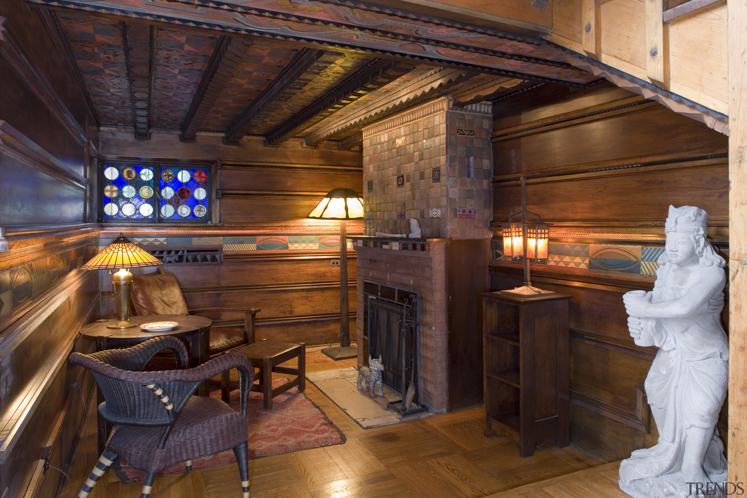 View of the under-stair 'nook' that contains artwork interior design, room, wood, red, brown