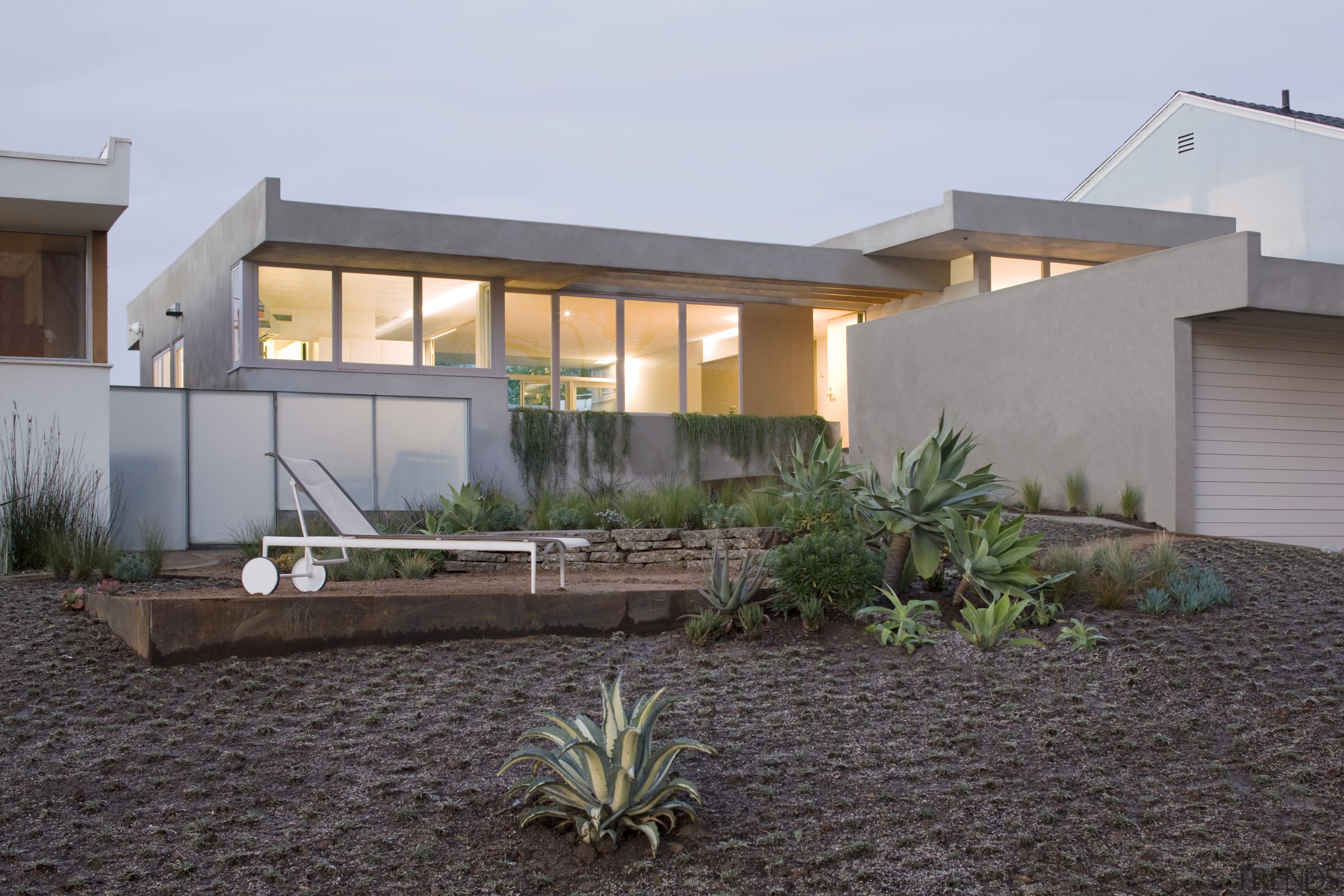 Exterior view of this contemporary home that was architecture, estate, facade, home, house, landscape, property, real estate, residential area, gray, black