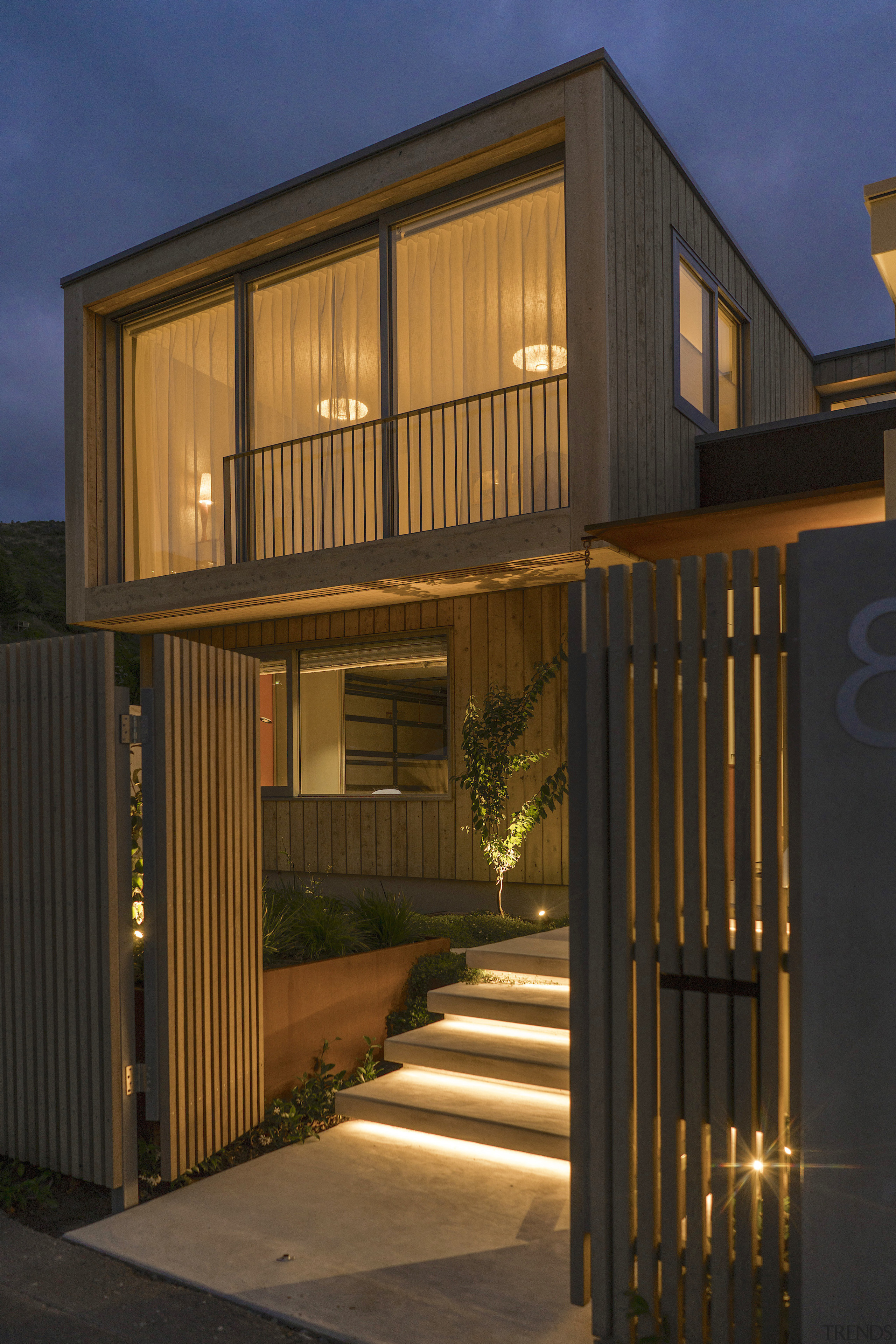 Entry at dusk – with bedroom above. - 