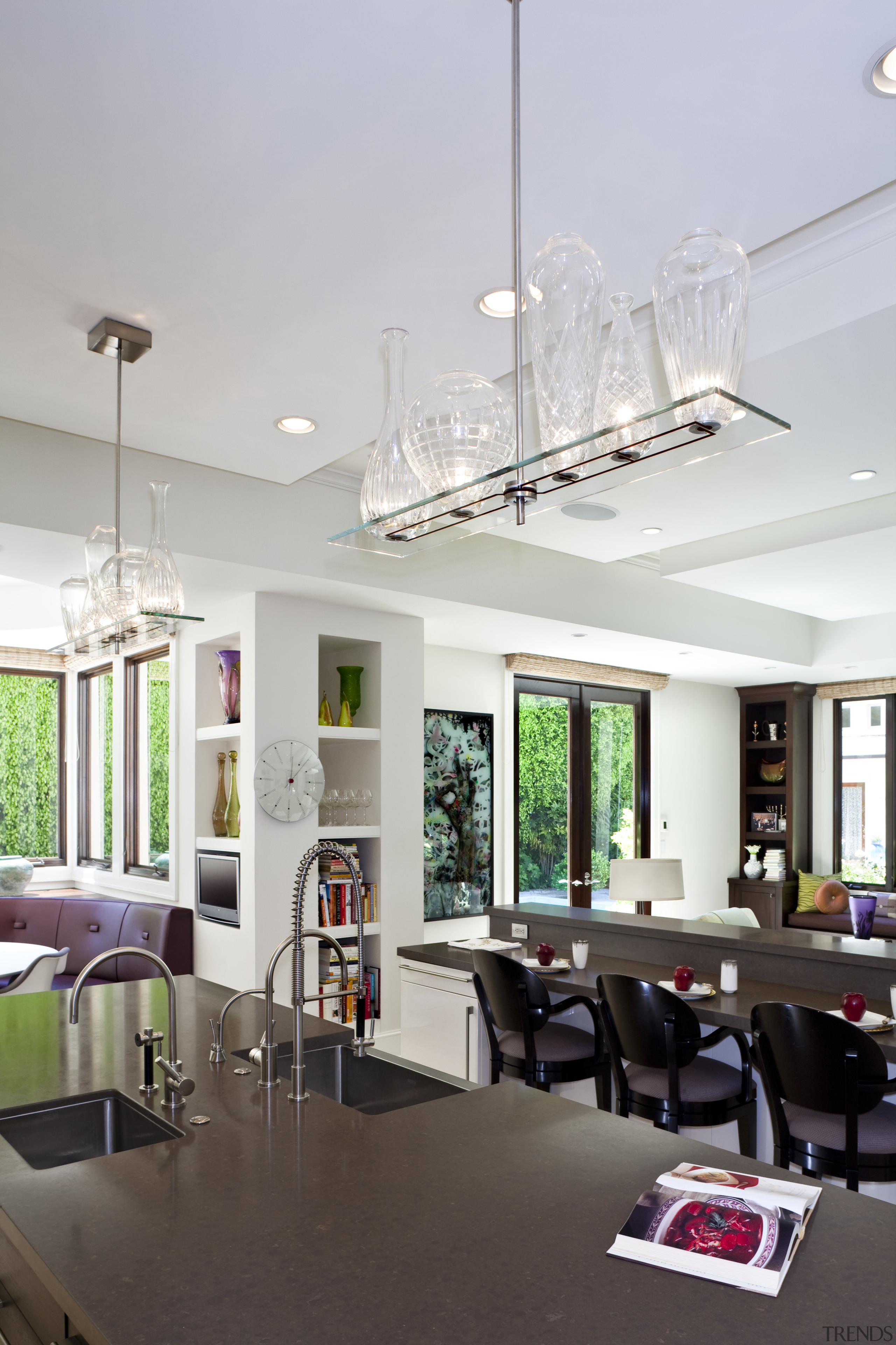 View of contemporary kitchen wooden flooring, dark cabinetry ceiling, dining room, interior design, light fixture, lighting, table, gray