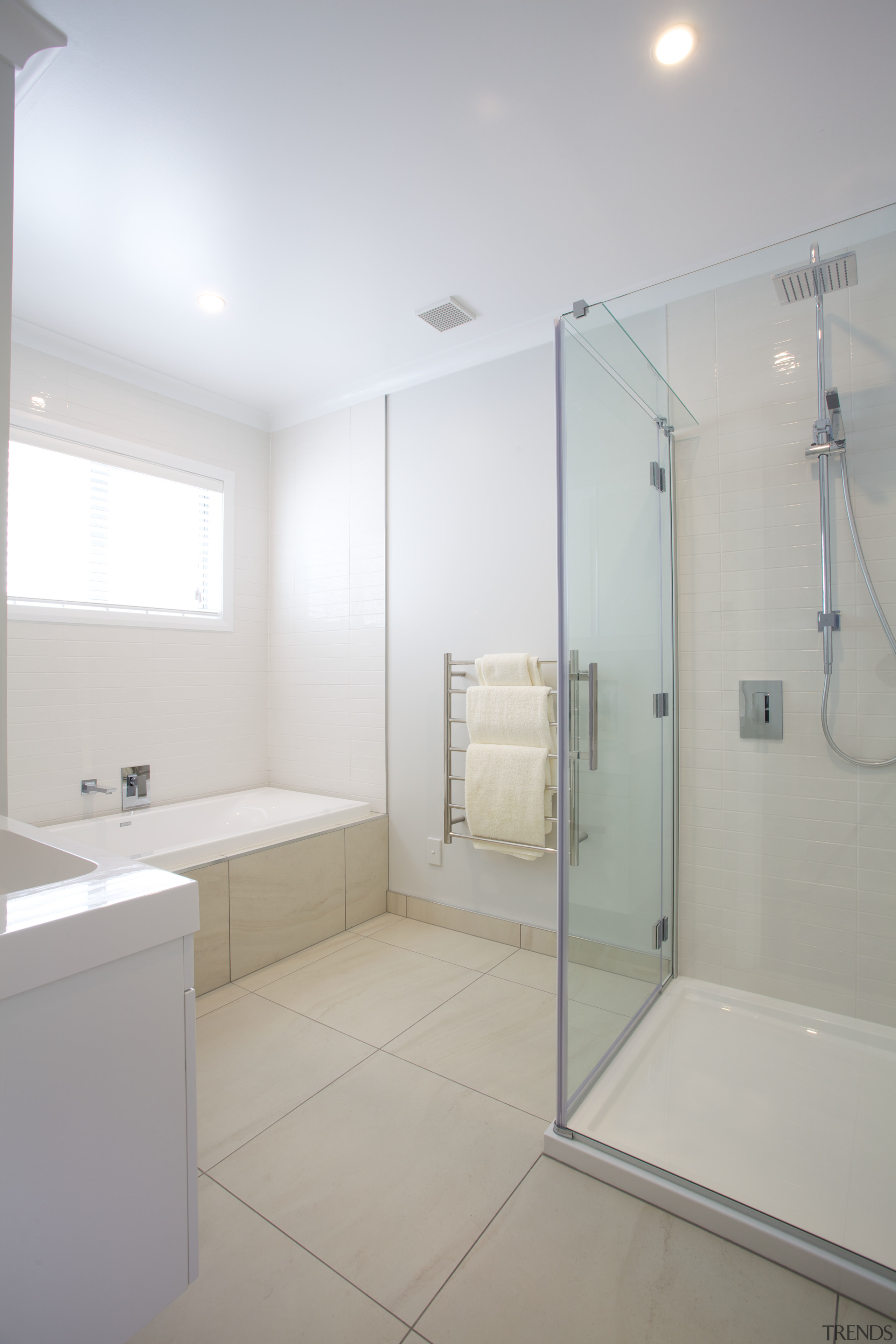 Sleek, contemporary bathrooms feature throughout this show home architecture, bathroom, ceiling, daylighting, floor, home, interior design, plumbing fixture, product design, property, real estate, room, tile, gray, white