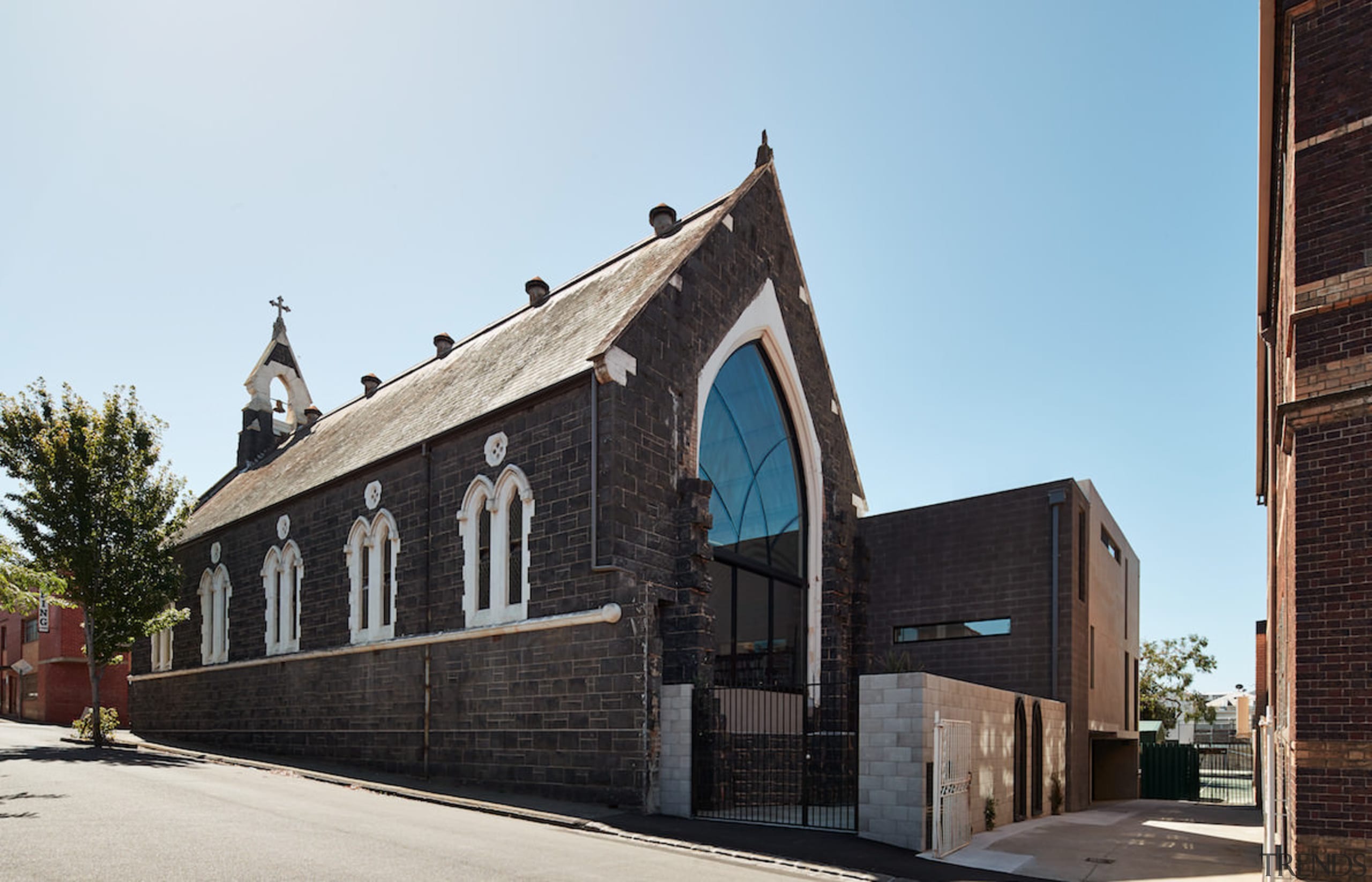 The original building appears largely untouched from the building, chapel, church, facade, house, place of worship, window, black, white