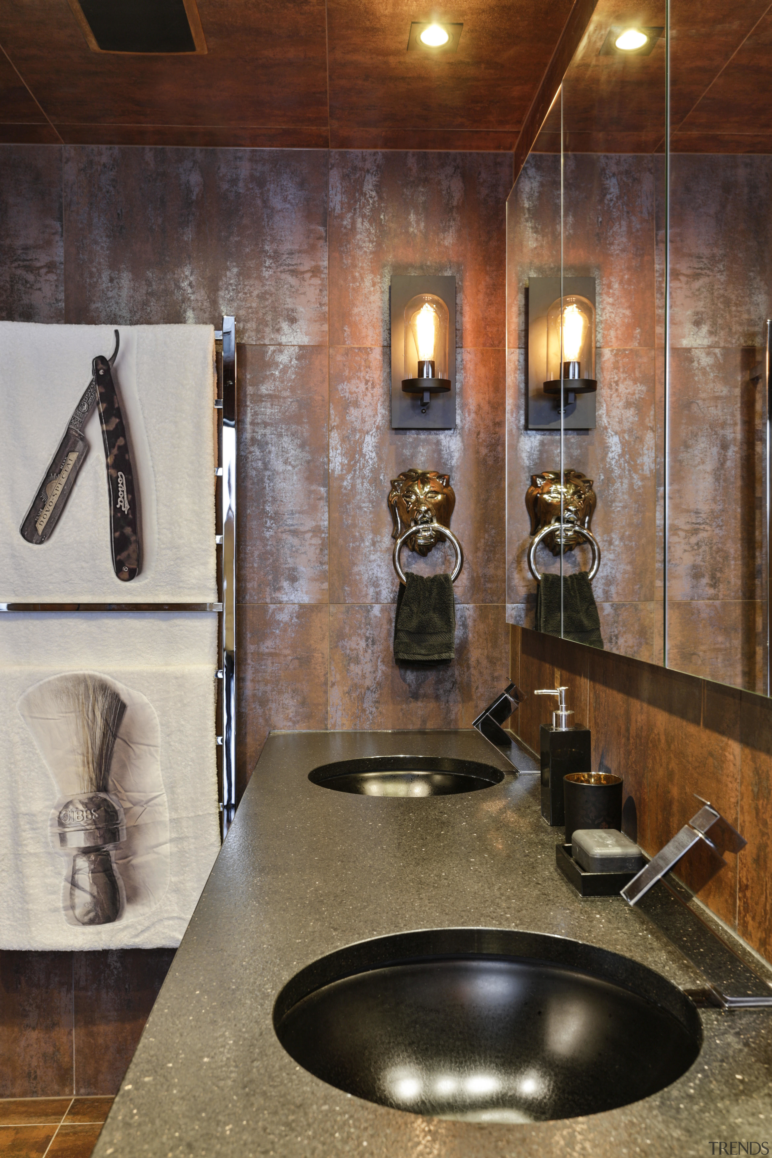 A sparkling black granite benchtop with black sinks bathroom, countertop, flooring, interior design, room, sink, brown