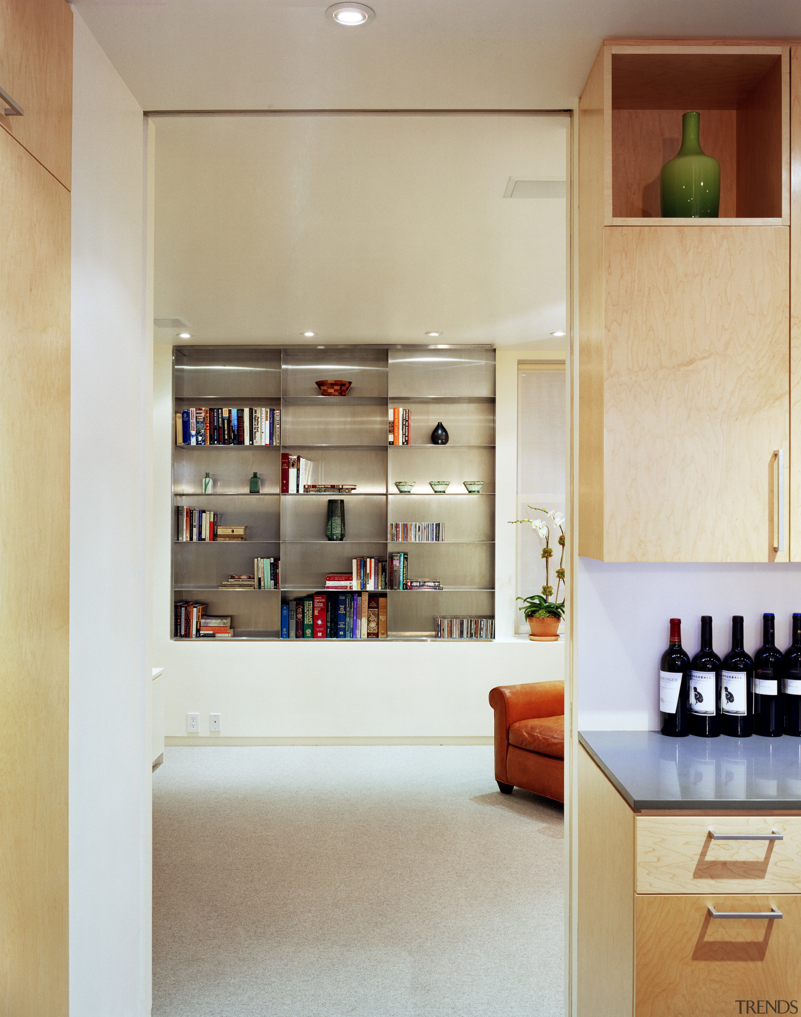 View of kitchen which features a separated living cabinetry, furniture, interior design, kitchen, room, shelf, shelving, orange