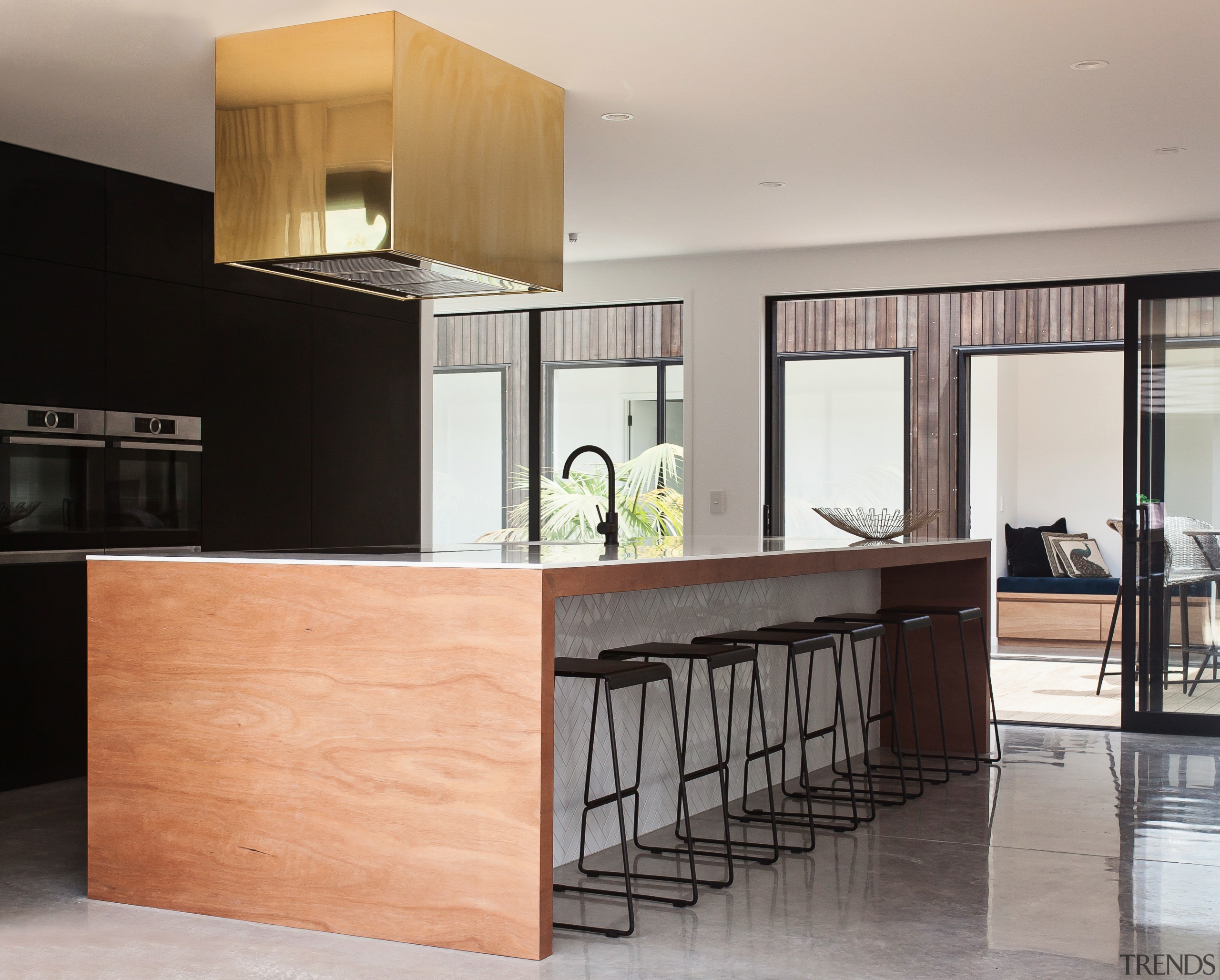 This kitchen achieves an abstract quality with all cabinetry, countertop, cuisine classique, floor, furniture, interior design, kitchen, gray