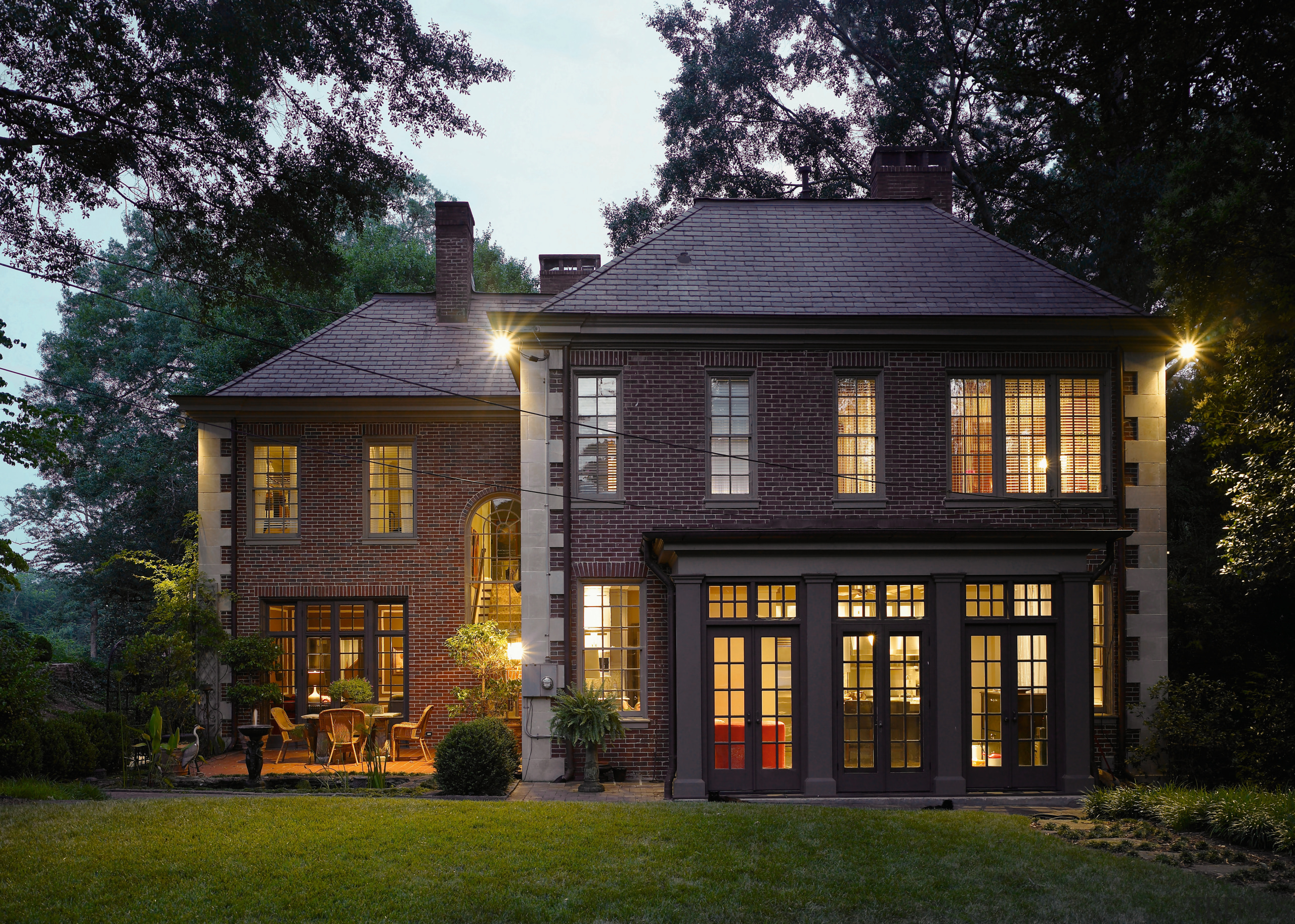 New French doors at the rear of the building, cottage, estate, evening, facade, farmhouse, home, house, lighting, mansion, property, real estate, residential area, siding, window, black