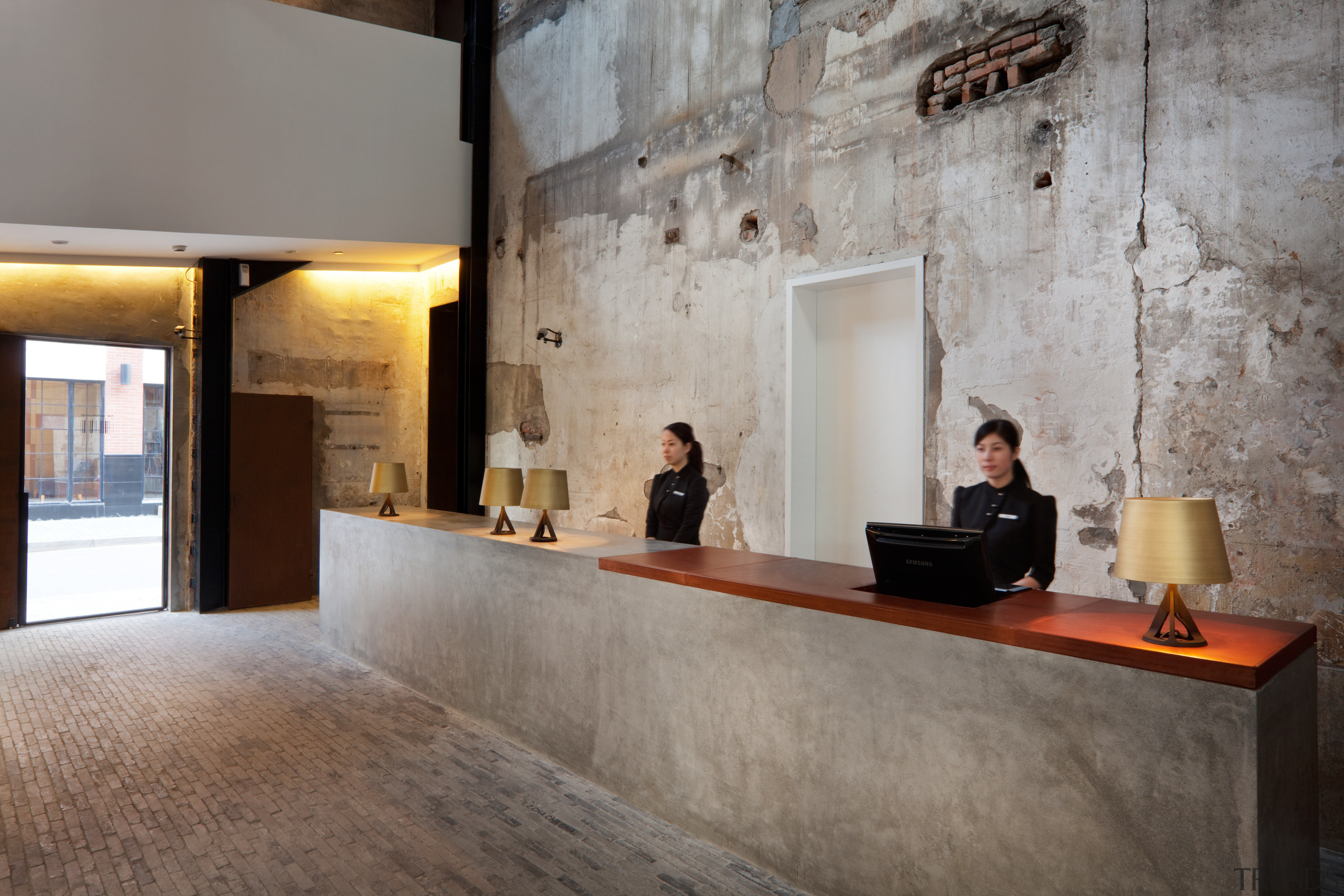 View of a contemporary boutique hotel in Shanghai. floor, flooring, interior design, lobby, gray