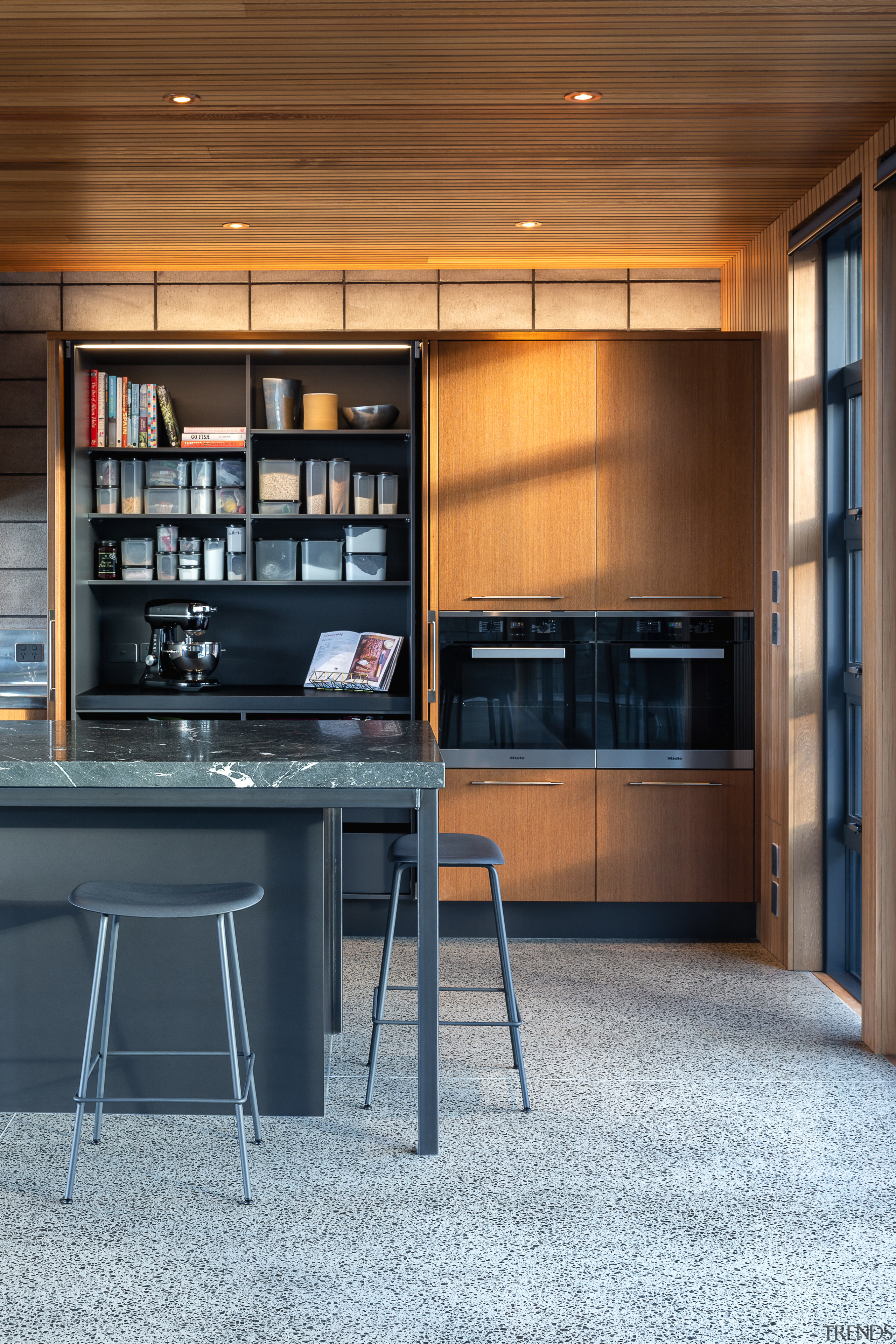 ​​​​​​​When your passion is baking it makes sense architecture, building, cabinetry, ceiling, countertop, cupboard, floor, flooring, furniture, home, house, interior design, kitchen, plywood, property, room, shelf, shelving, table, wood, brown