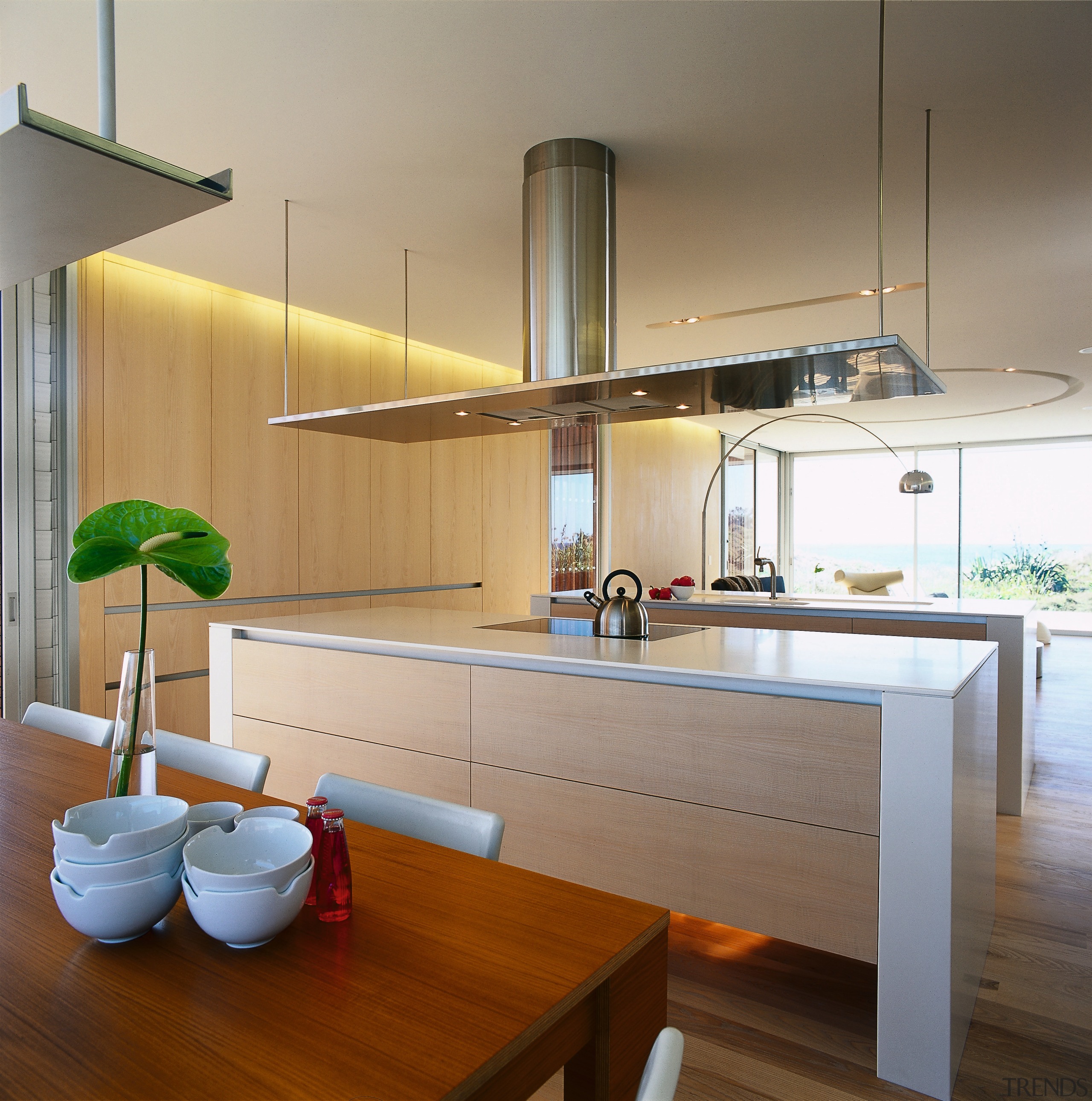 A view of a kitchen area, wooden flooring, countertop, interior design, kitchen, product design, gray, brown