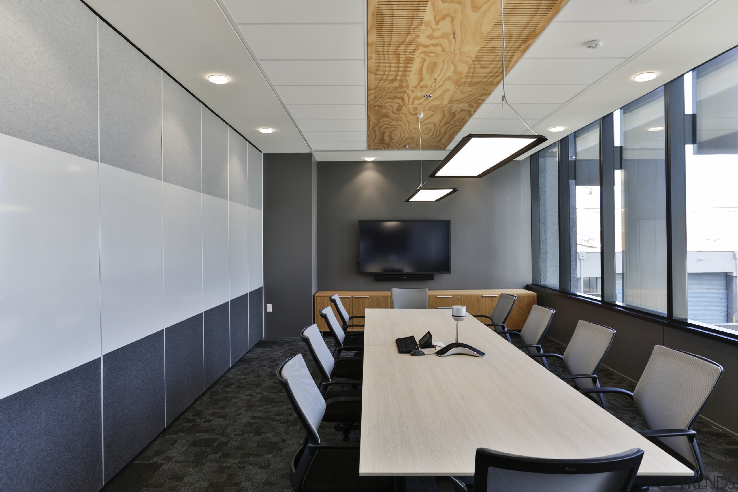 A meeting room in the new Datacom building architecture, ceiling, conference hall, interior design, office, gray