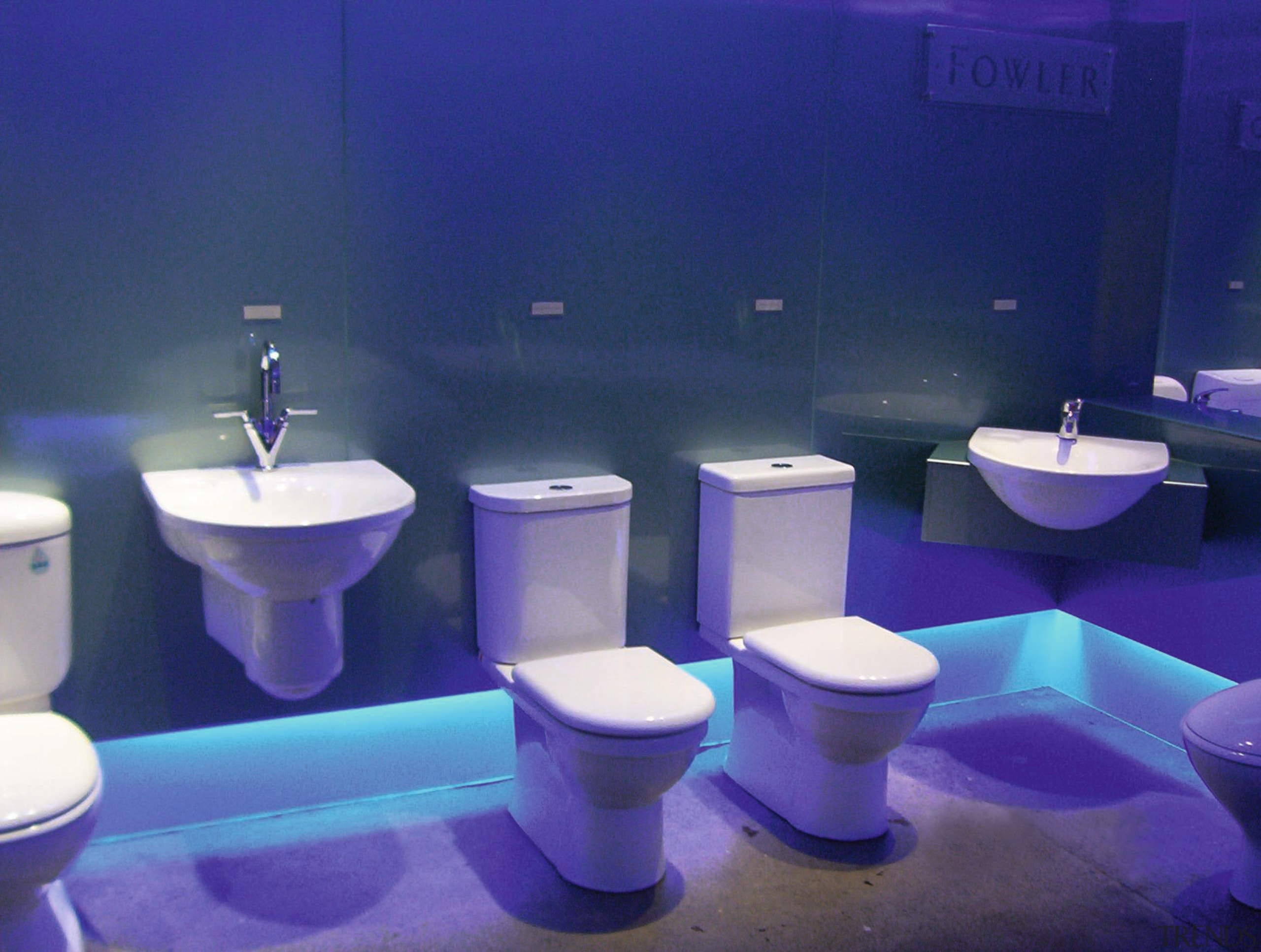 The view of bathroomware in a showroom - bathroom, blue, light, plumbing fixture, product, product design, purple, toilet, toilet seat, blue