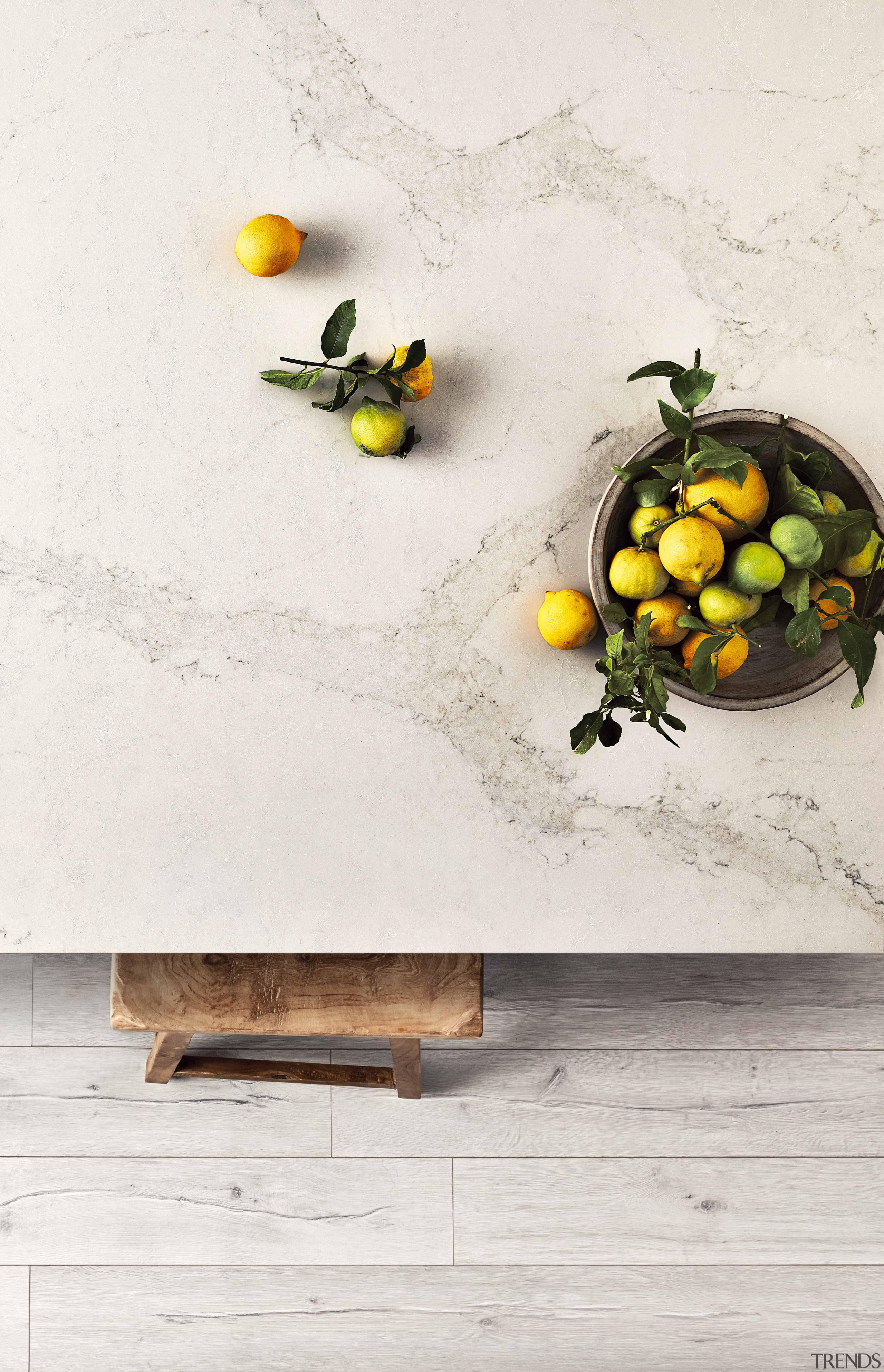 As Caesarstone's interpretation of natural Calacatta marble, Calacatta fruit, produce, still life photography, table, yellow, white