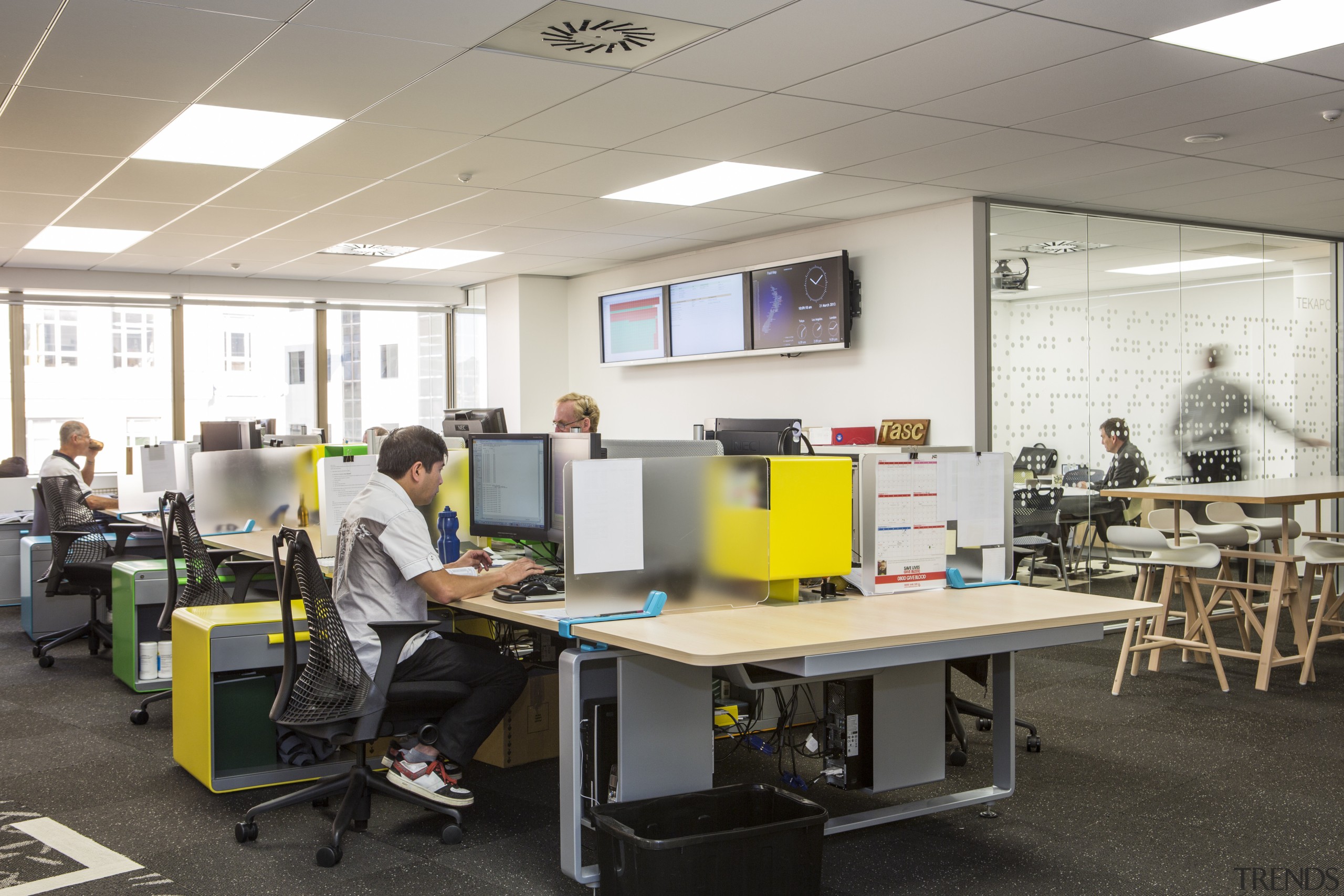 Staff workstations are positioned along benches. - Staff classroom, desk, furniture, institution, job, office, white