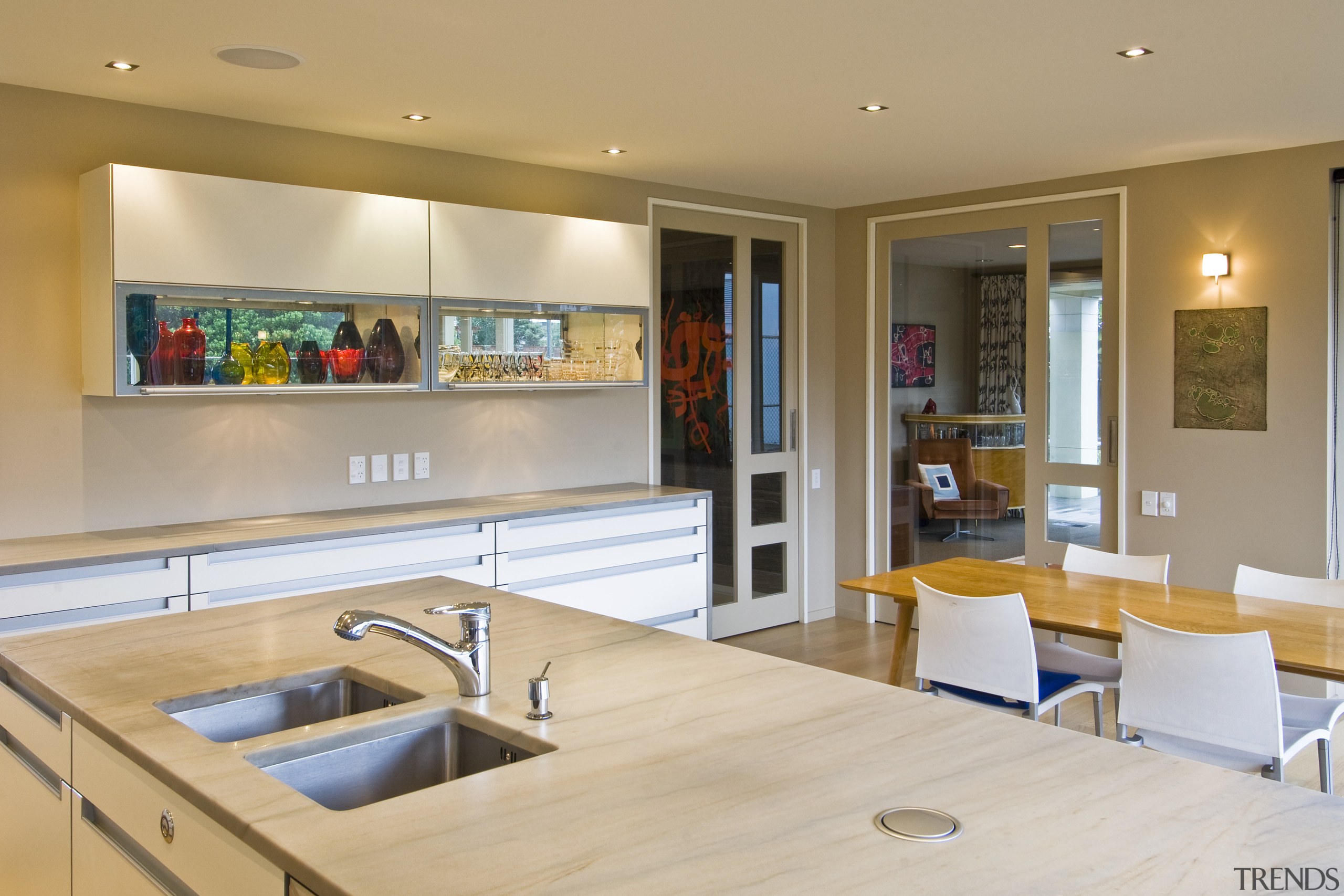 View of kitchen which has been designed by countertop, interior design, kitchen, real estate, orange, gray