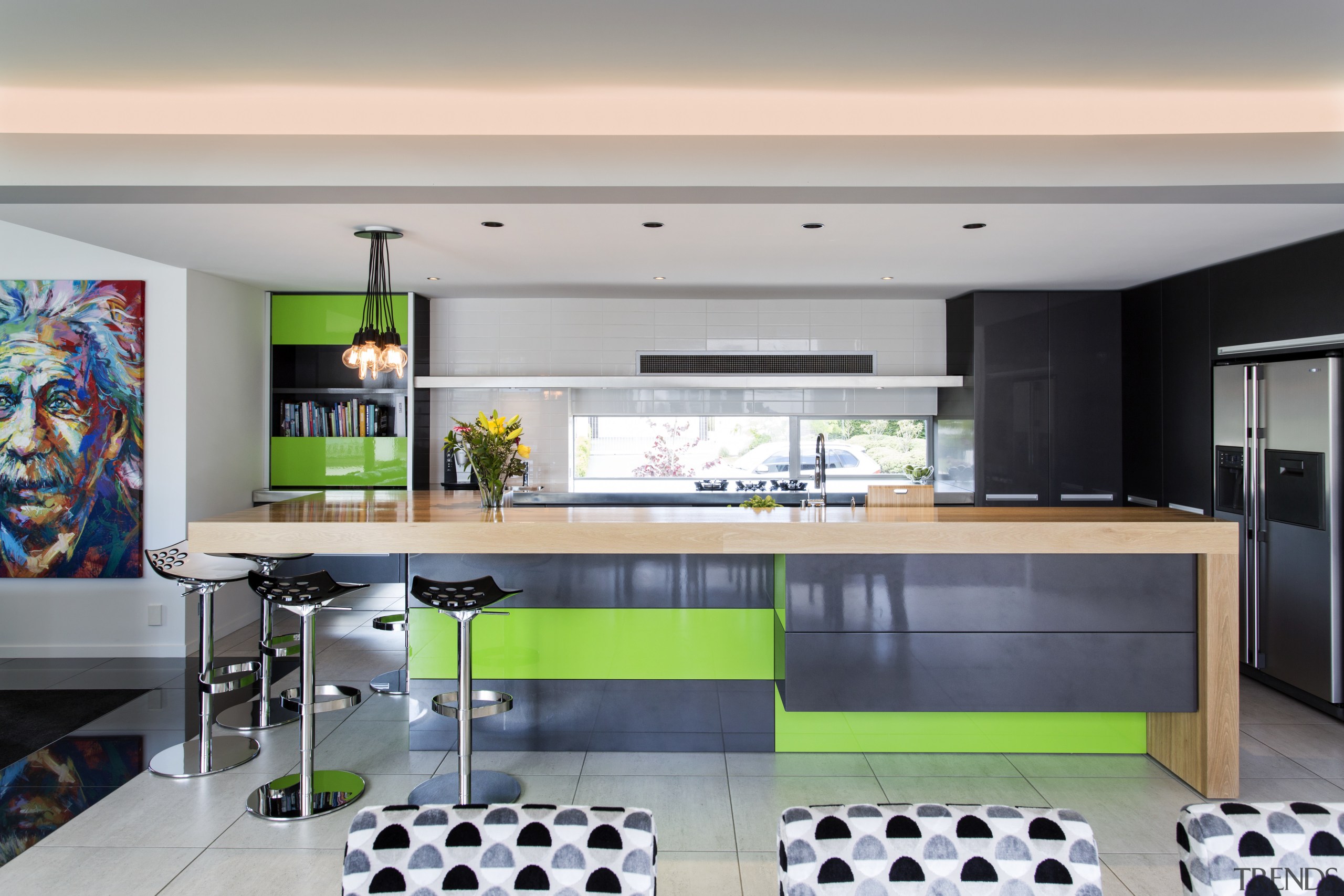 Contrasting metallic lime green and charcoal cabinetry faces countertop, interior design, kitchen, gray