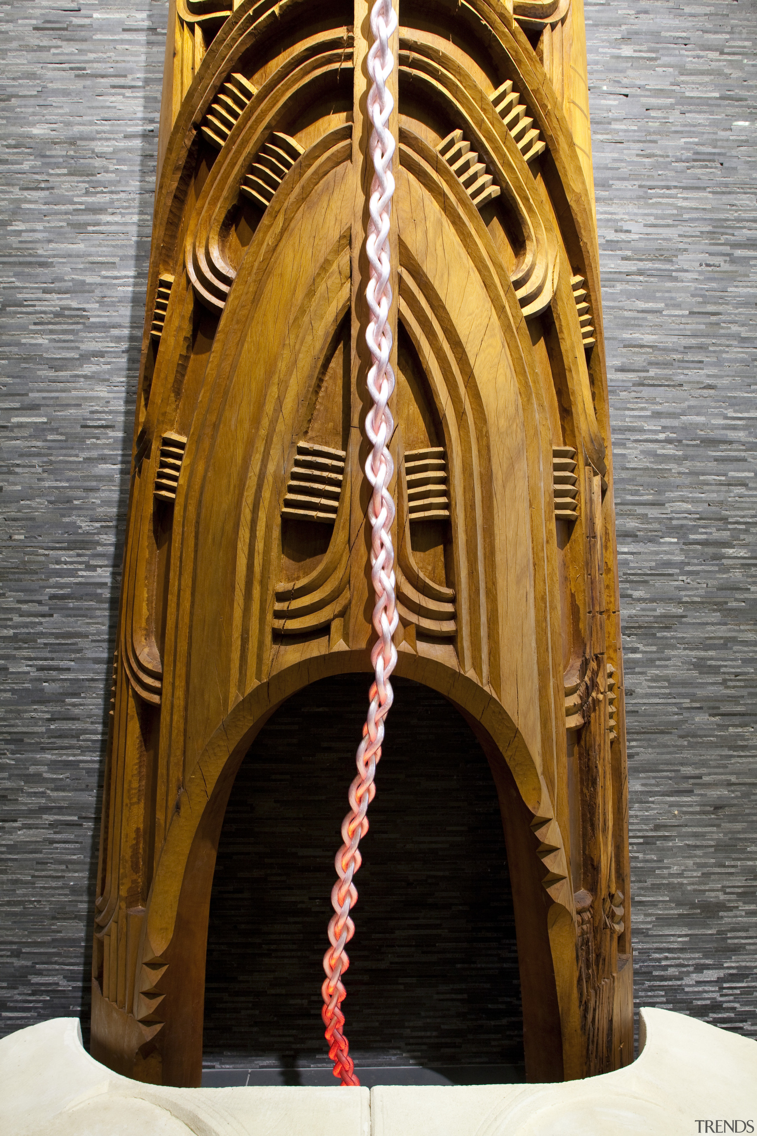 View of Maori carving in the entrance foyer arch, wood, black