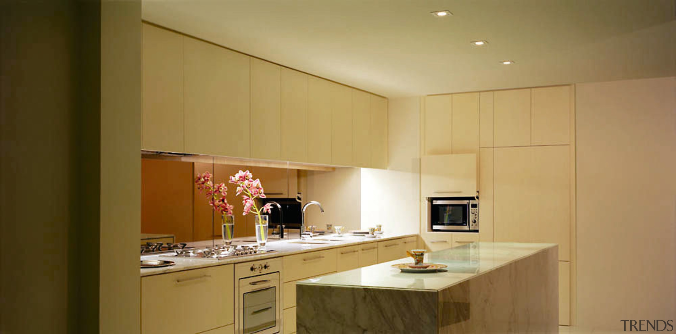 Kitchen with cream cabinetry, stone island, built in cabinetry, ceiling, countertop, interior design, kitchen, property, real estate, room, brown, orange